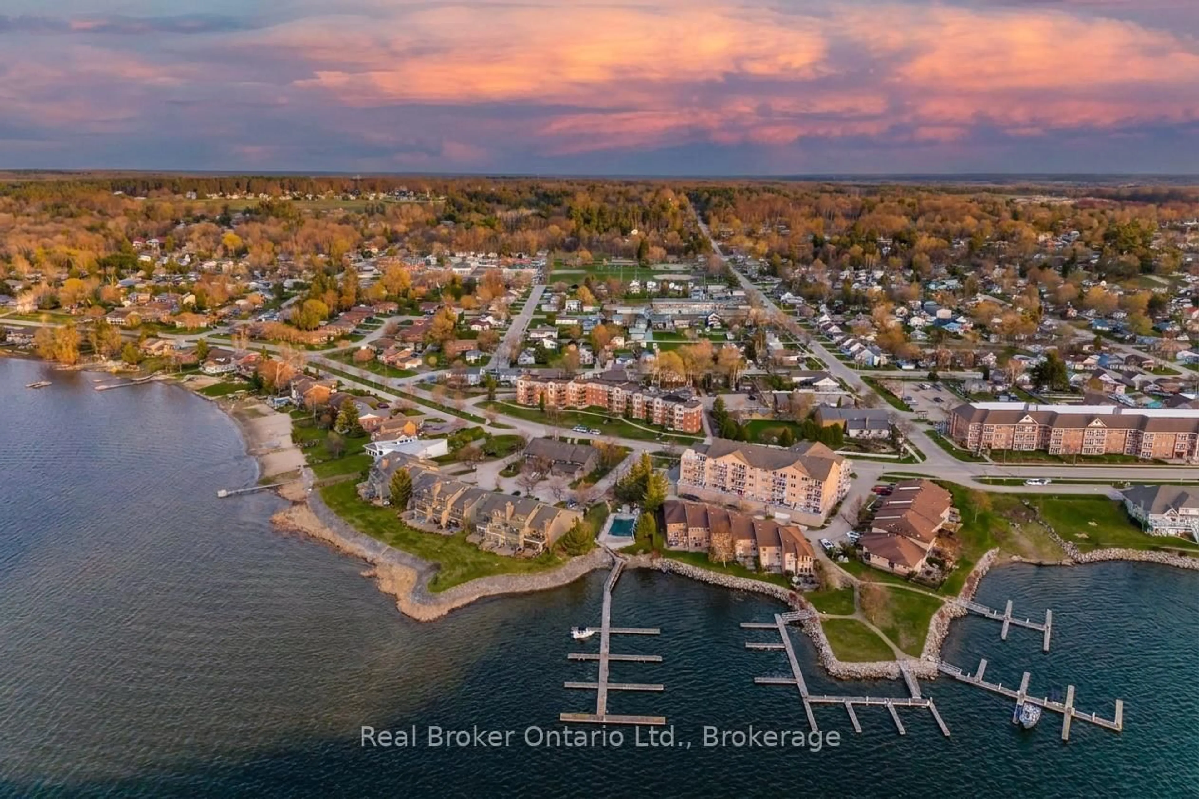 A pic from outside/outdoor area/front of a property/back of a property/a pic from drone, water/lake/river/ocean view for 11 Beck Blvd #402, Penetanguishene Ontario L9M 2G1