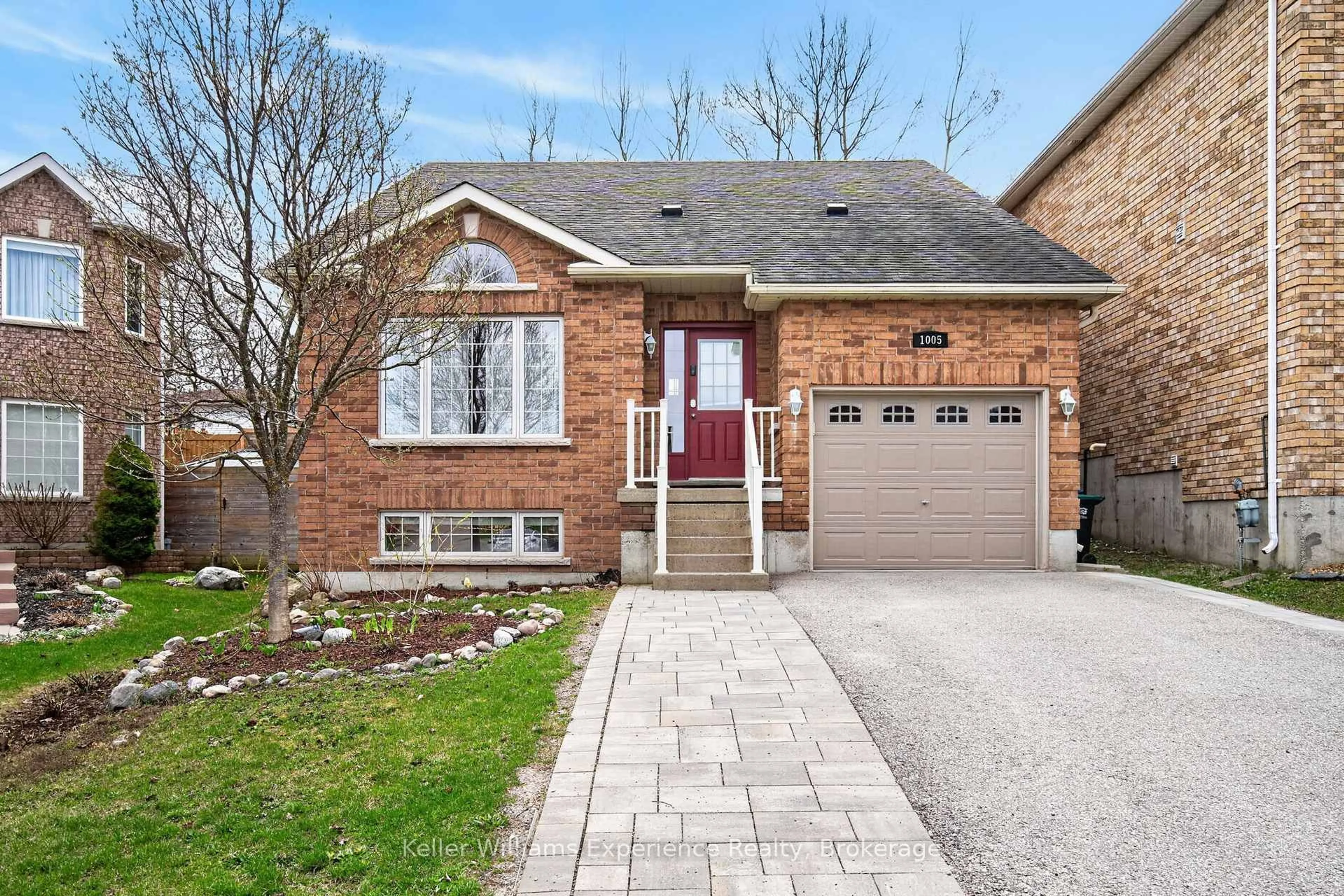 Home with brick exterior material, street for 1005 WHITNEY Cres, Midland Ontario L4R 5N3