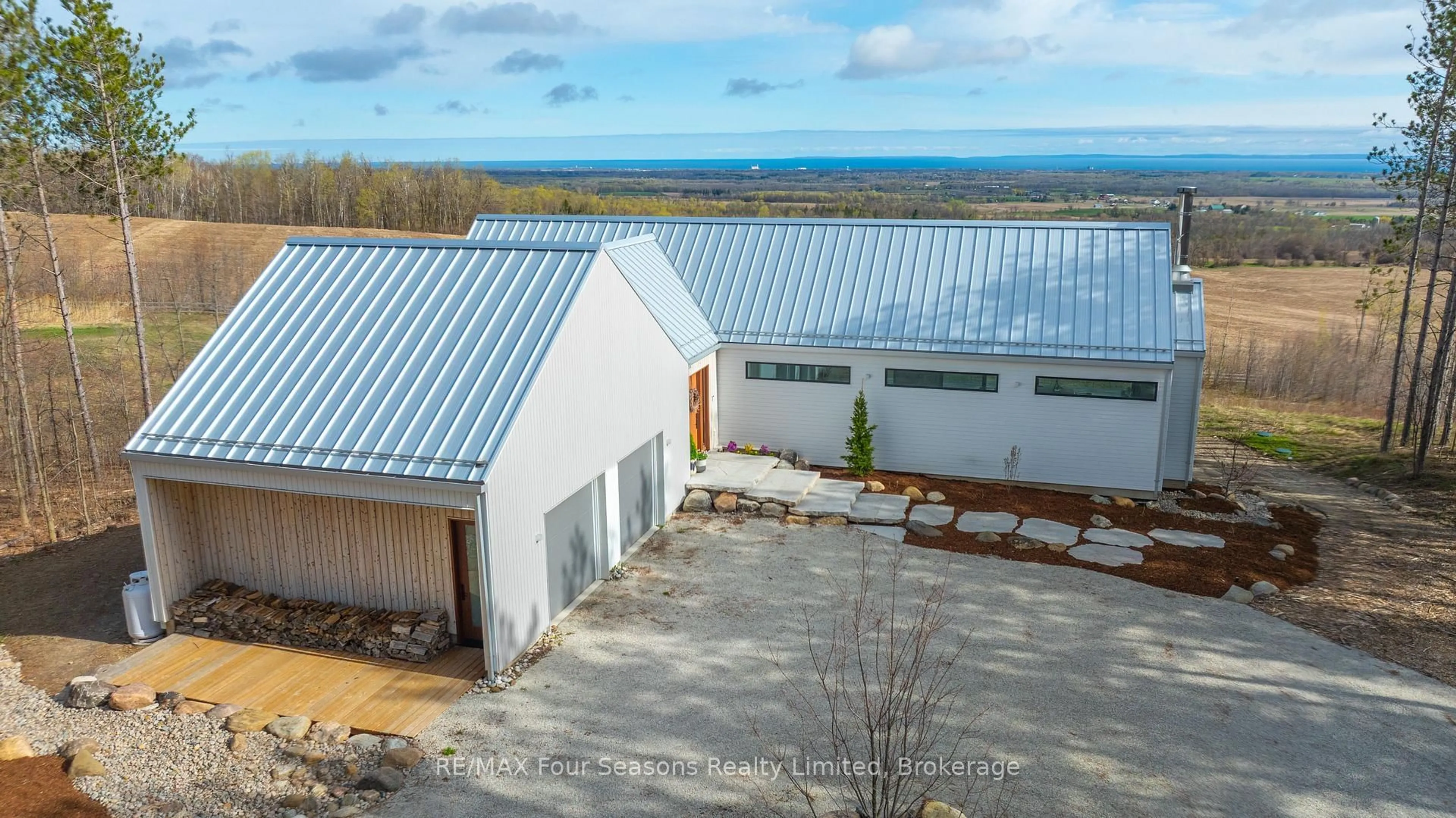 A pic from outside/outdoor area/front of a property/back of a property/a pic from drone, water/lake/river/ocean view for 58 Sydenham Tr, Clearview Ontario L0M 1H0