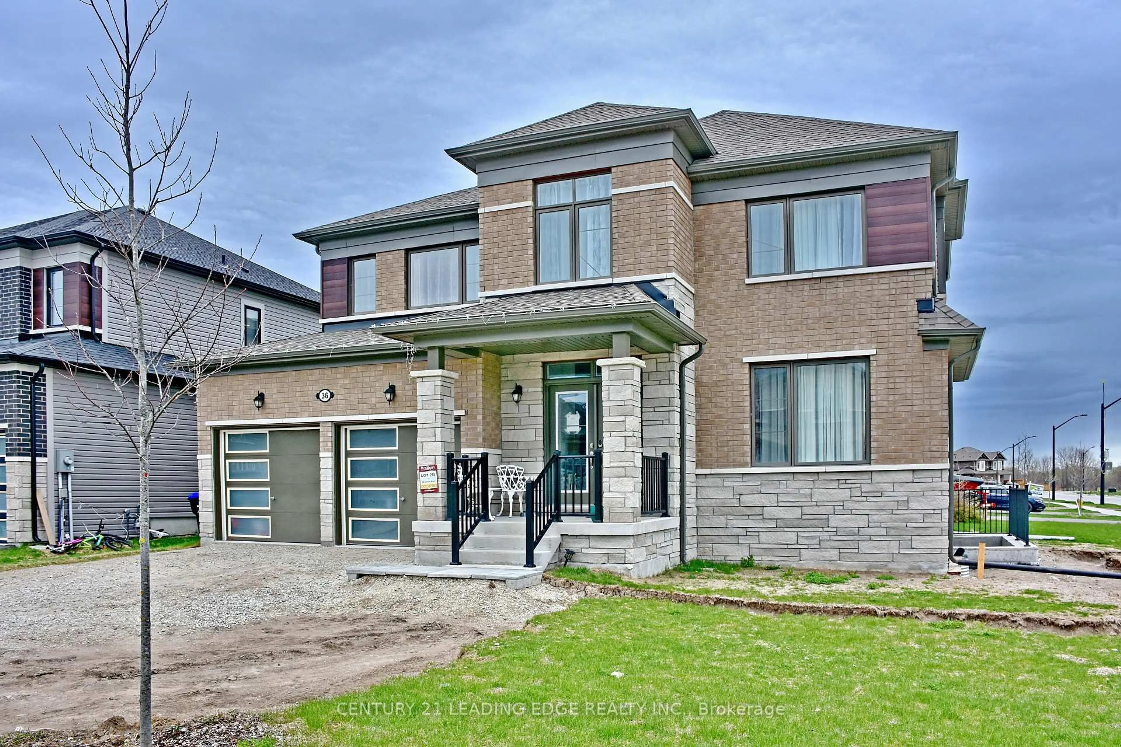 Home with brick exterior material, street for 36 Union Blvd, Wasaga Beach Ontario L9Z 0L9