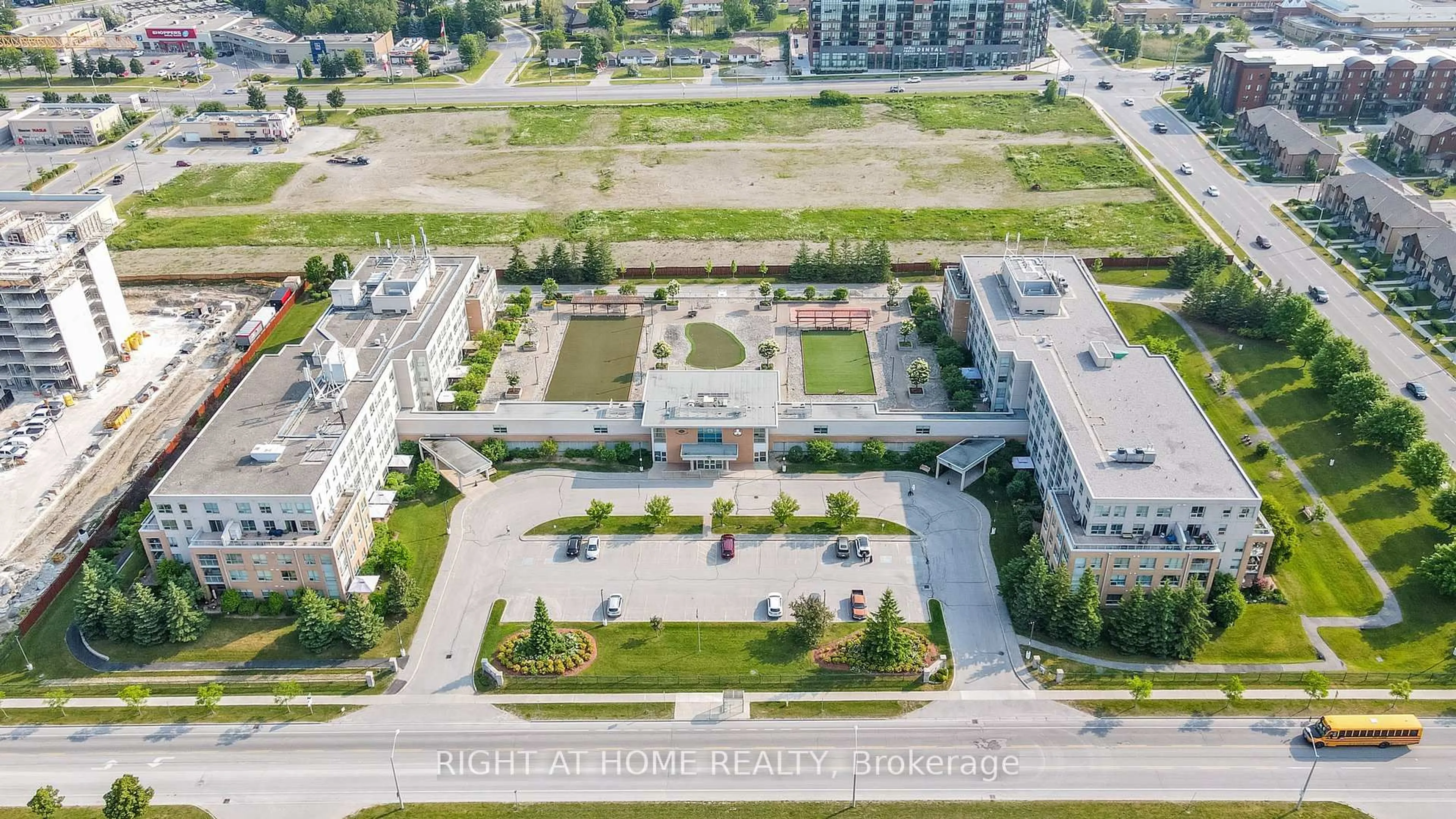 A pic from outside/outdoor area/front of a property/back of a property/a pic from drone, unknown for 90 Dean Ave #410, Barrie Ontario L4N 0M3