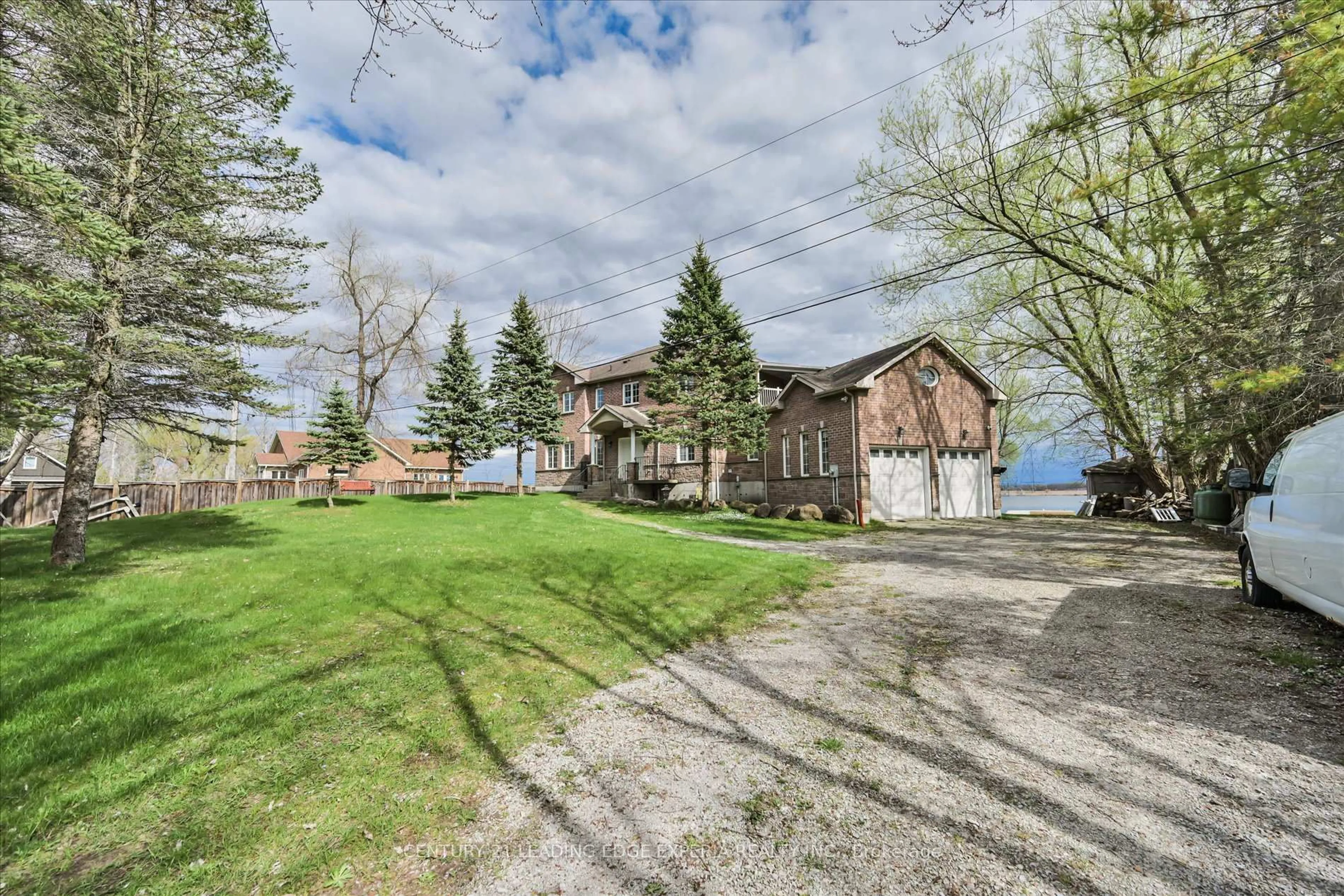 A pic from outside/outdoor area/front of a property/back of a property/a pic from drone, water/lake/river/ocean view for 3213 Quiet Waters Lane, Tay Ontario L0K 2C0