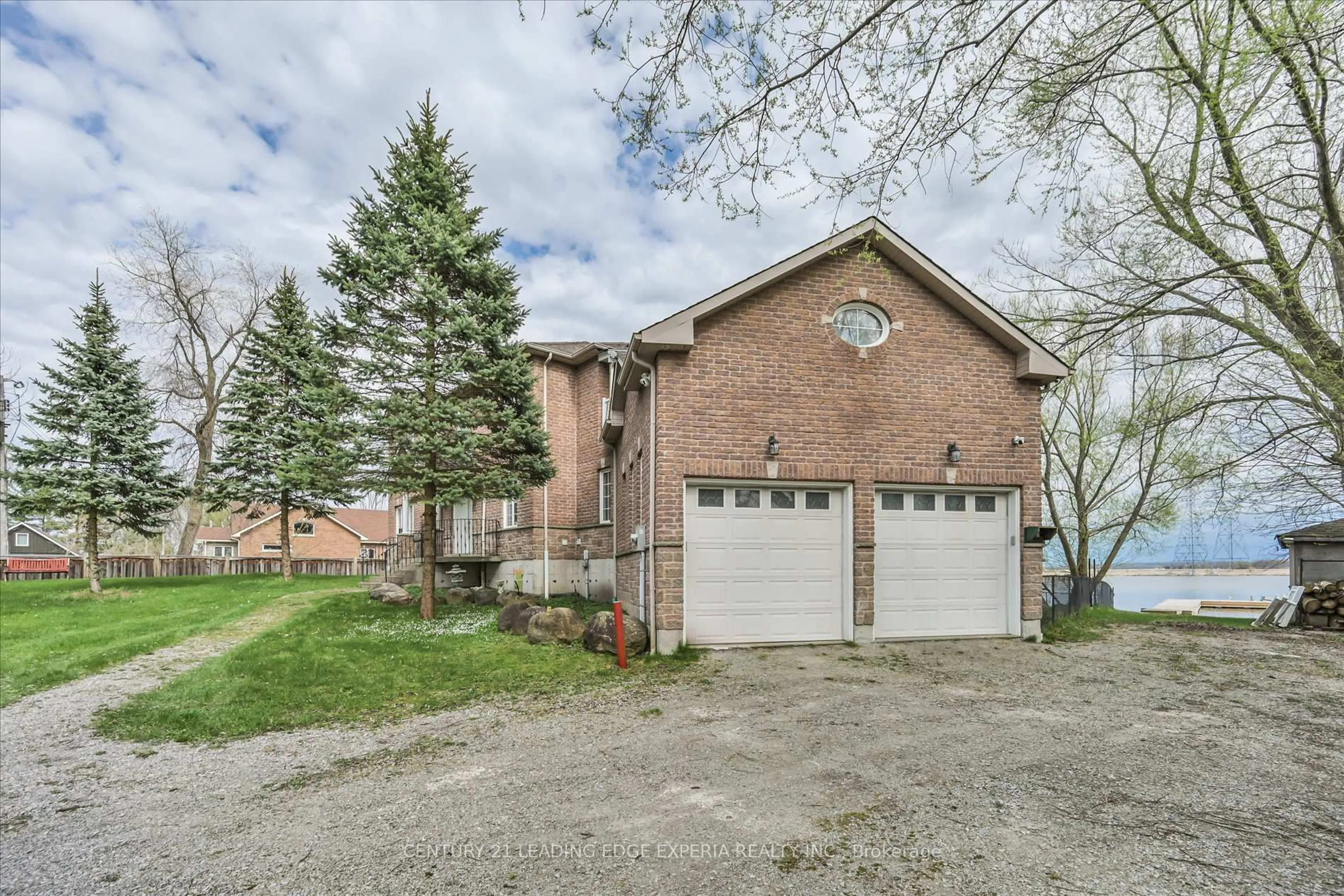 Home with brick exterior material, street for 3213 Quiet Waters Lane, Tay Ontario L0K 2C0