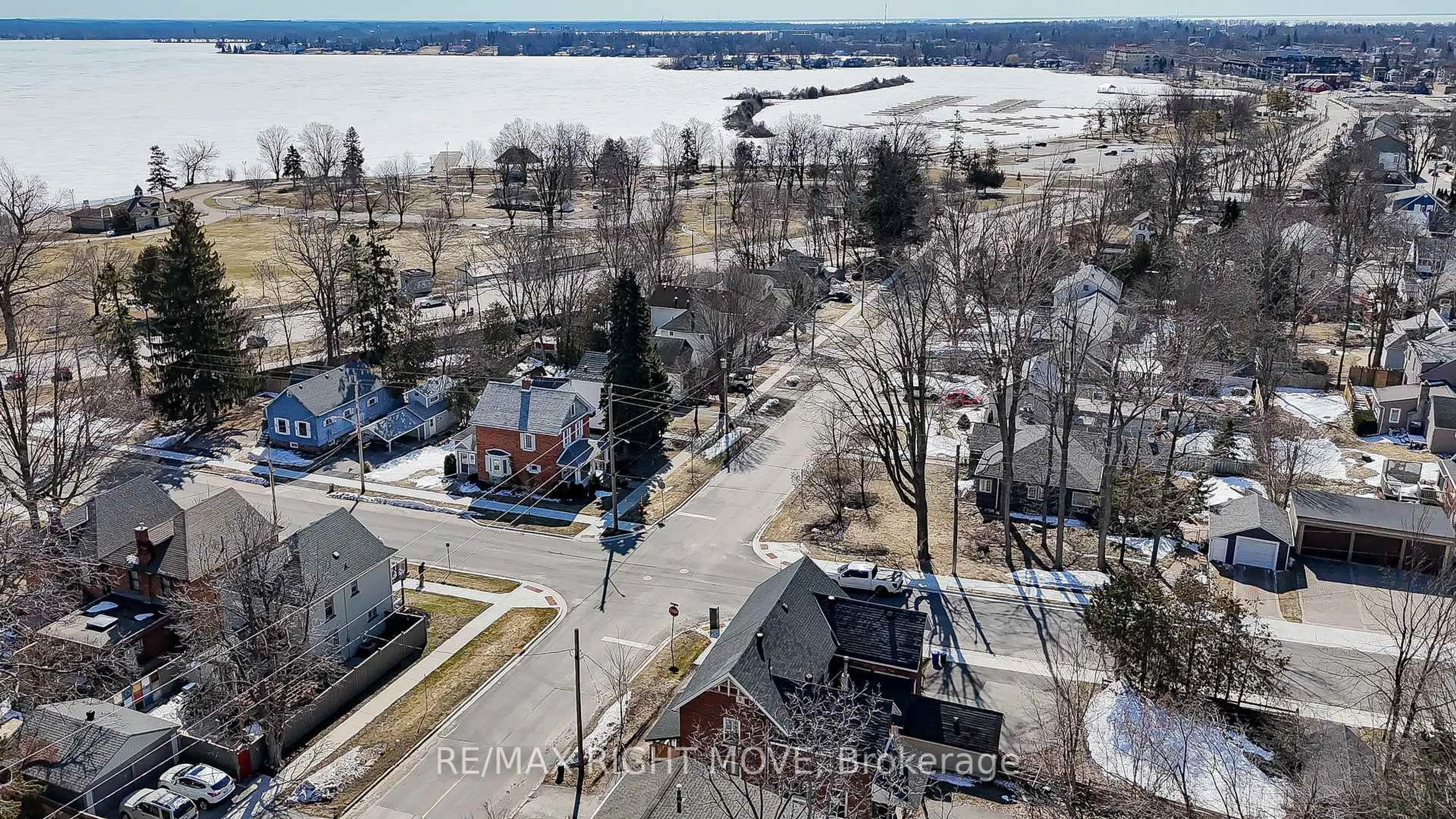 A pic from outside/outdoor area/front of a property/back of a property/a pic from drone, water/lake/river/ocean view for 203 CANICE St, Orillia Ontario L3V 4J1