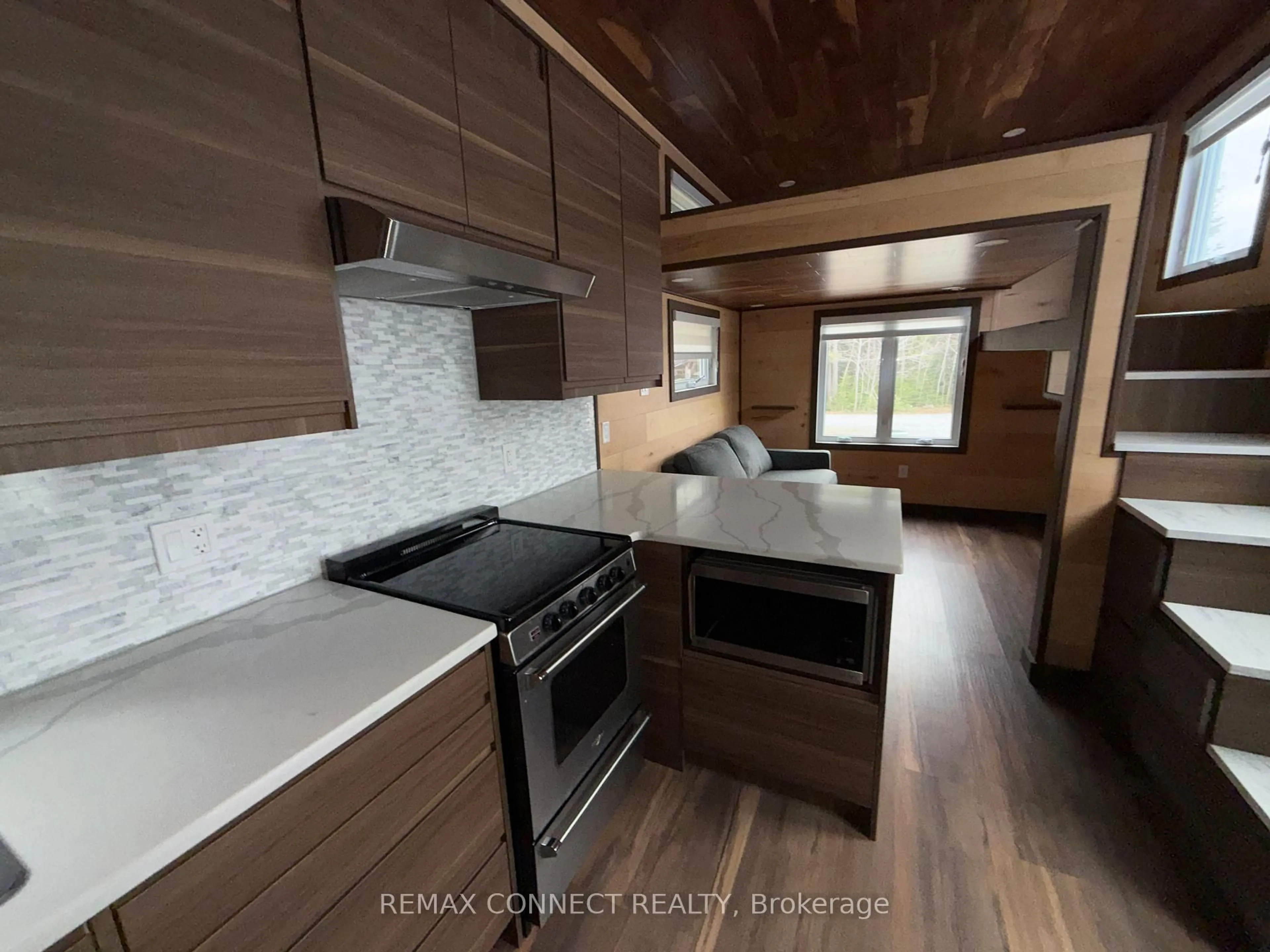 Open concept kitchen, wood/laminate floor for 4750 Side Road 5 #(1), Ramara Ontario L3V 0T2