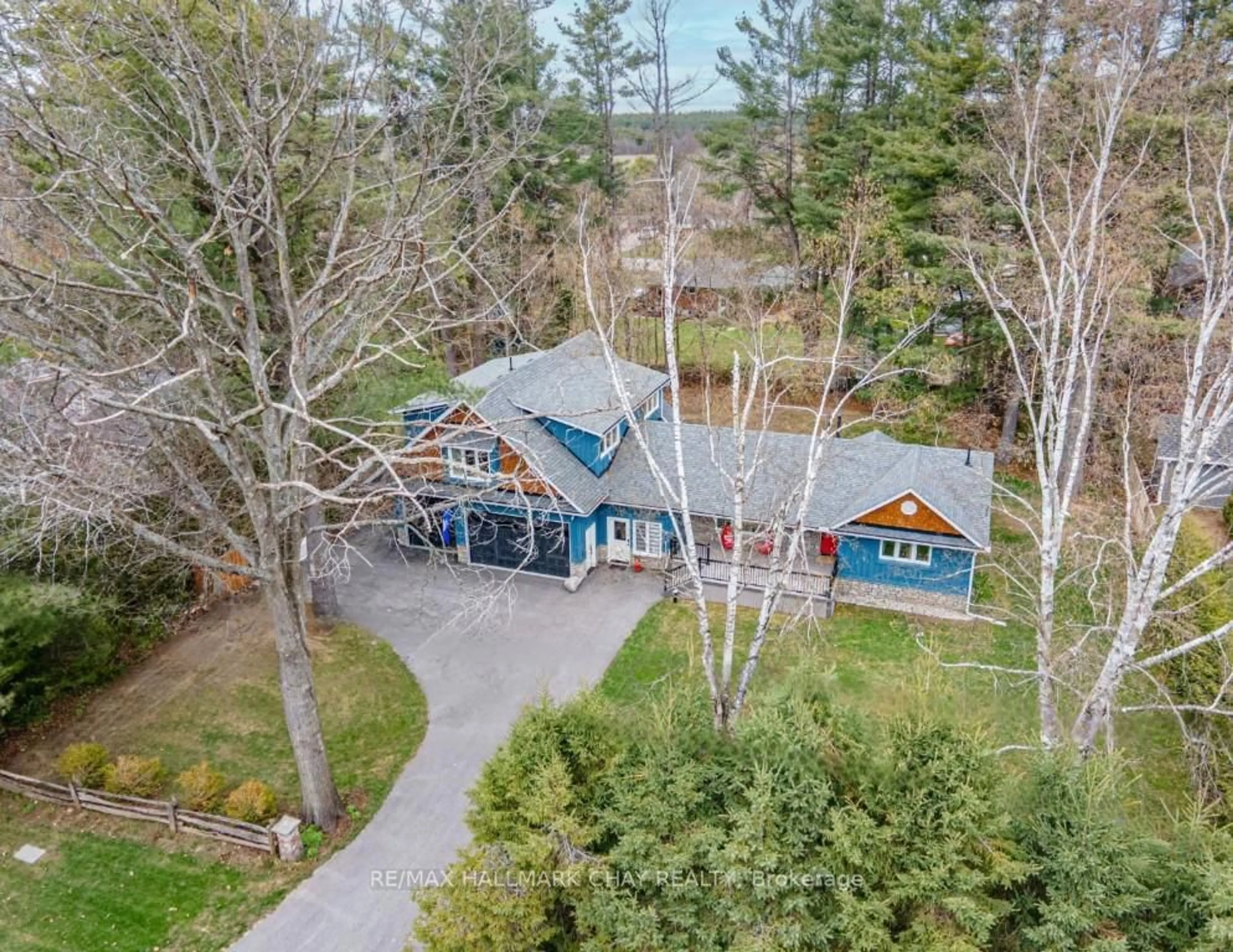 A pic from outside/outdoor area/front of a property/back of a property/a pic from drone, unknown for 18 Lawrence Ave, Springwater Ontario L9X 0W3
