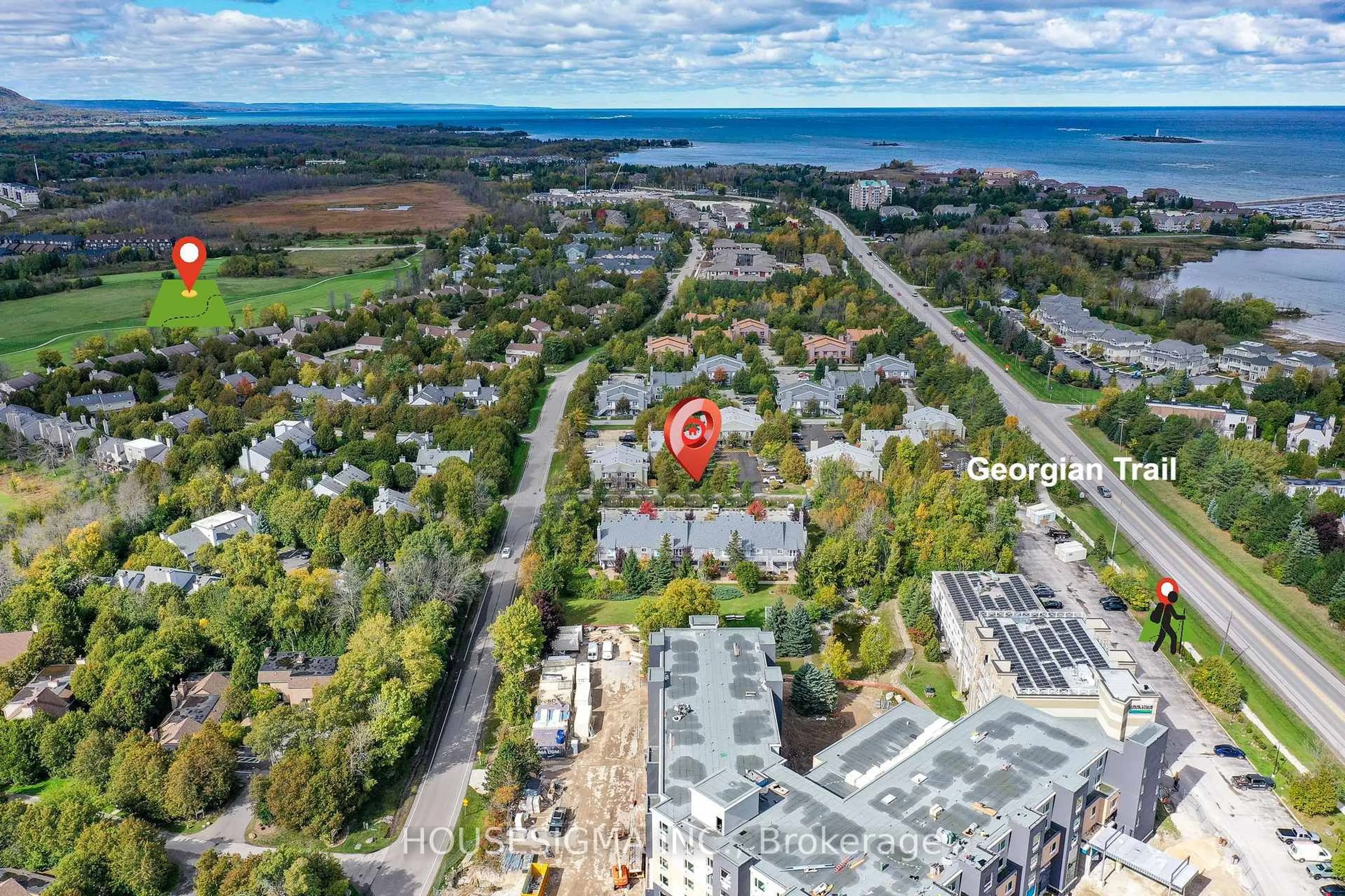 A pic from outside/outdoor area/front of a property/back of a property/a pic from drone, unknown for 11 Dawson Dr #718, Collingwood Ontario L9Y 5B4