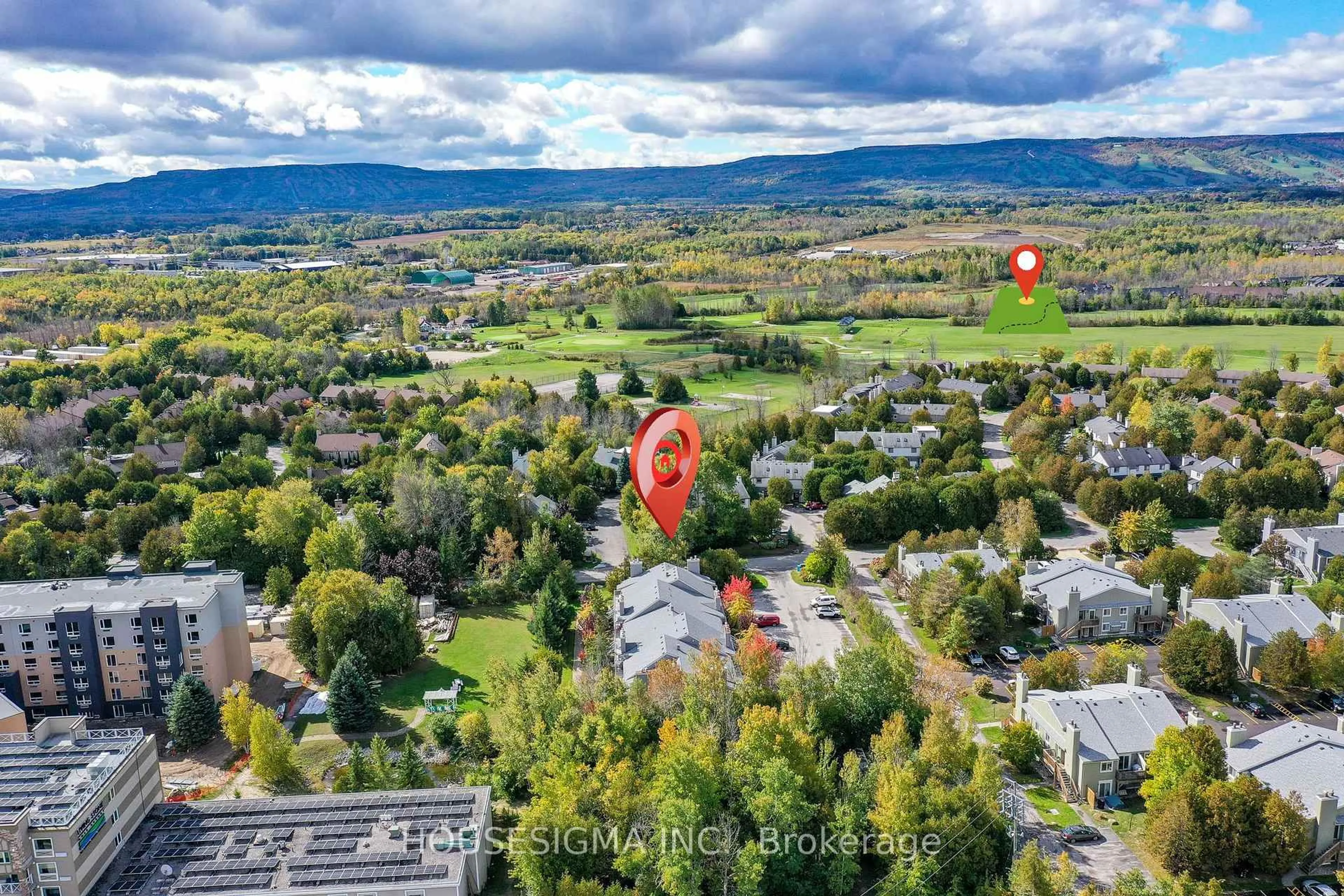 A pic from outside/outdoor area/front of a property/back of a property/a pic from drone, mountain view for 11 Dawson Dr #718, Collingwood Ontario L9Y 5B4