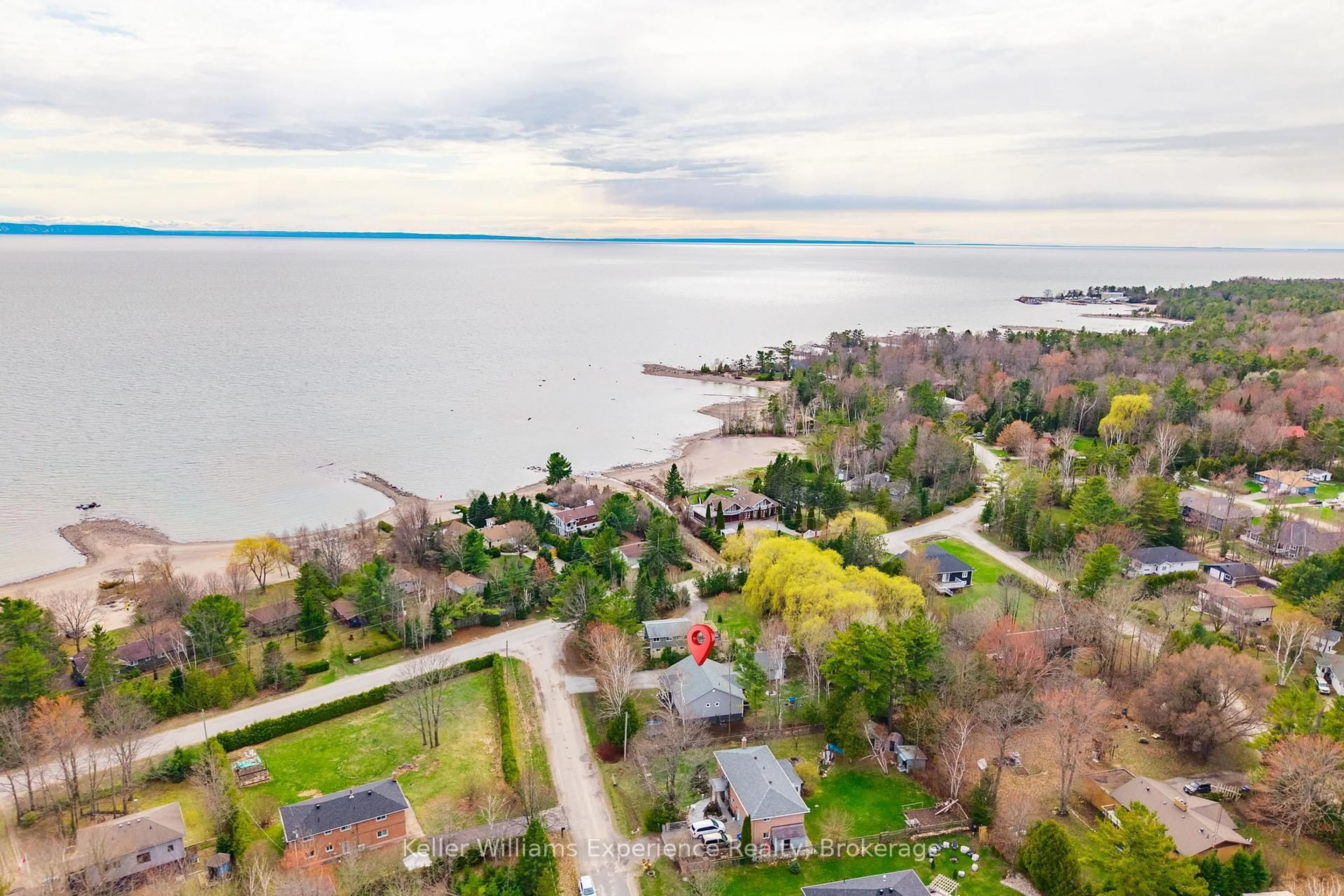 A pic from outside/outdoor area/front of a property/back of a property/a pic from drone, water/lake/river/ocean view for 66 Albion Lane, Tiny Ontario L9M 1R3