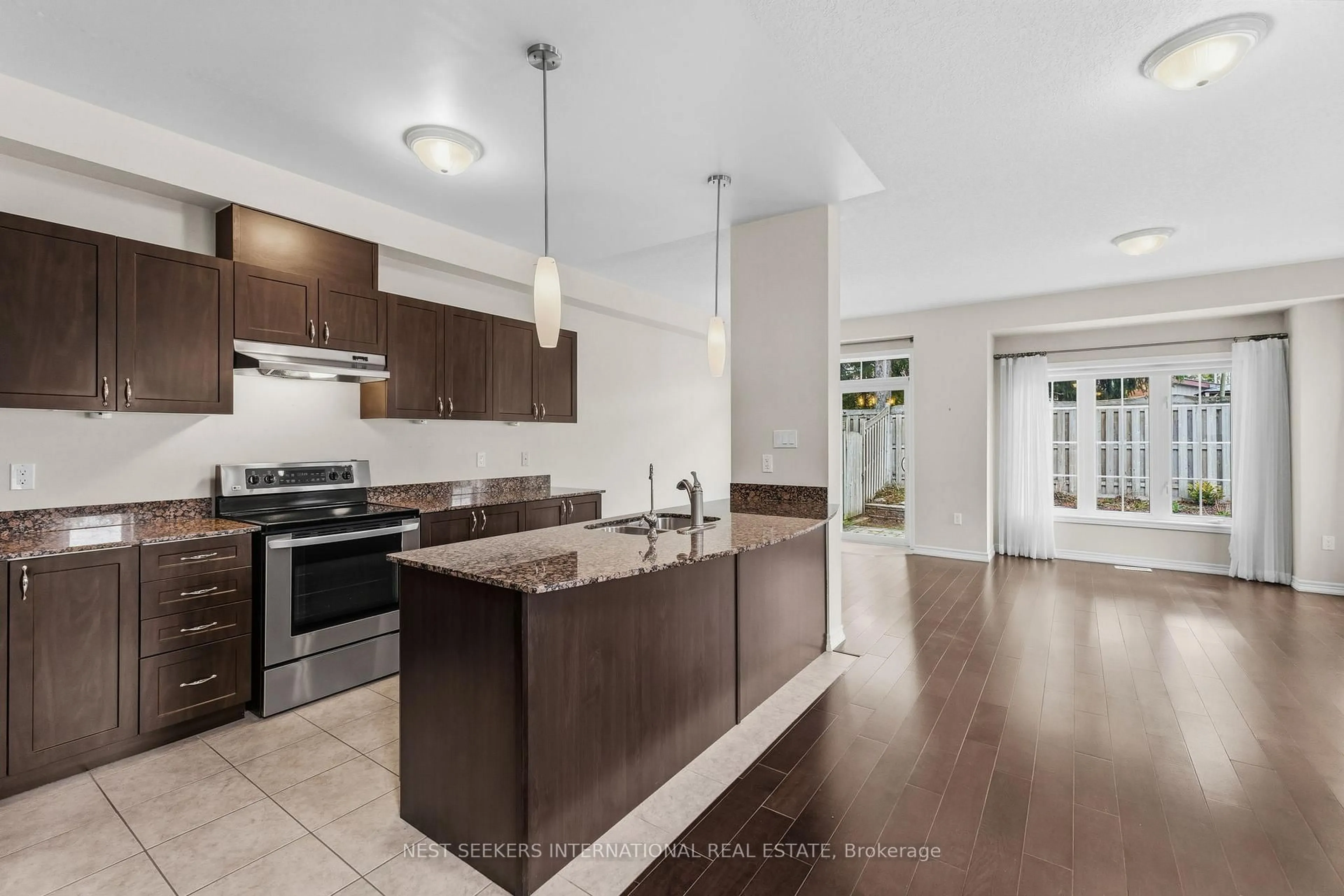 Open concept kitchen, ceramic/tile floor for 188 Coldwater Rd #11, Orillia Ontario L3V 3L9