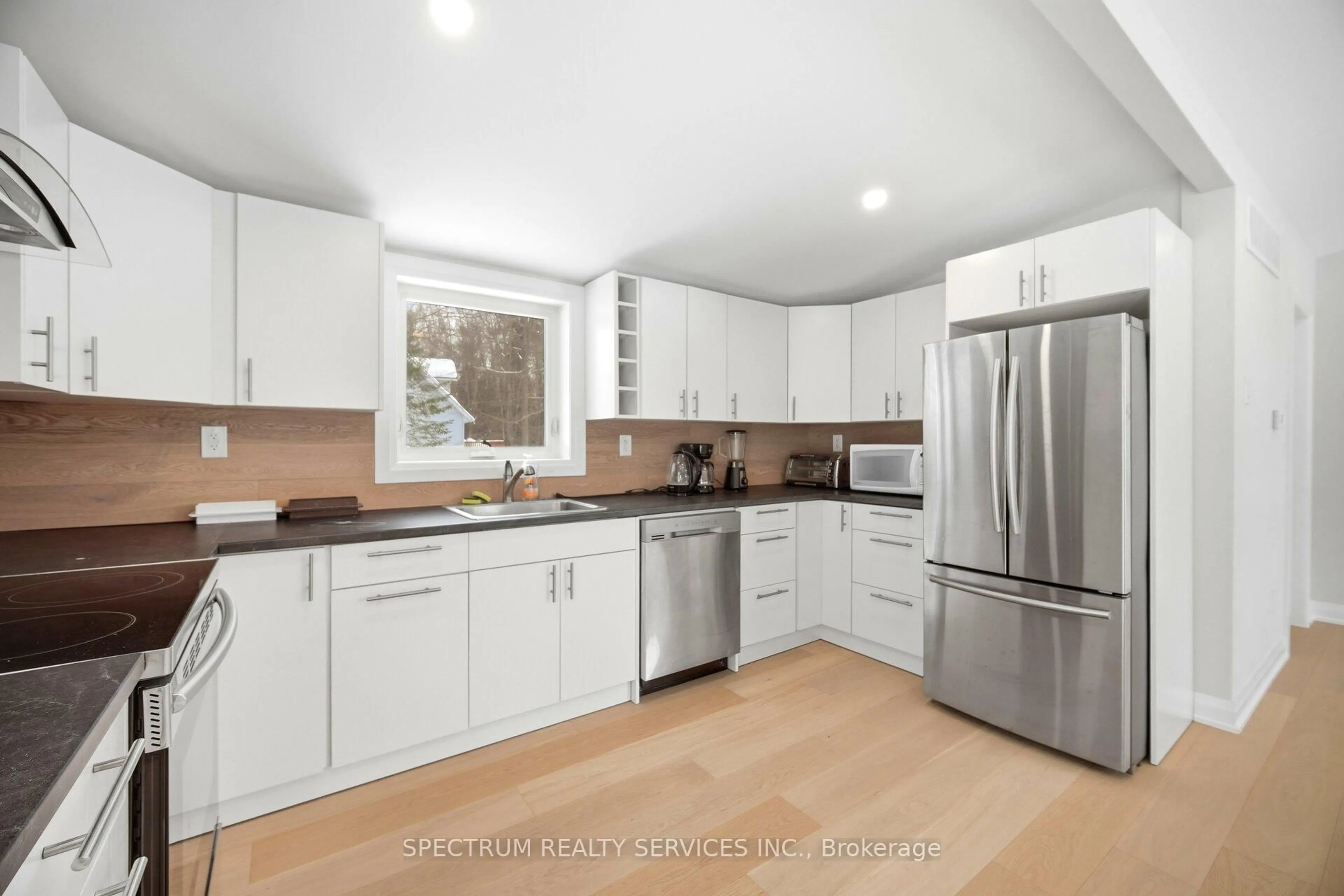 Open concept kitchen, unknown for 161 Antigua Dr, Wasaga Beach Ontario L9Z 2S2