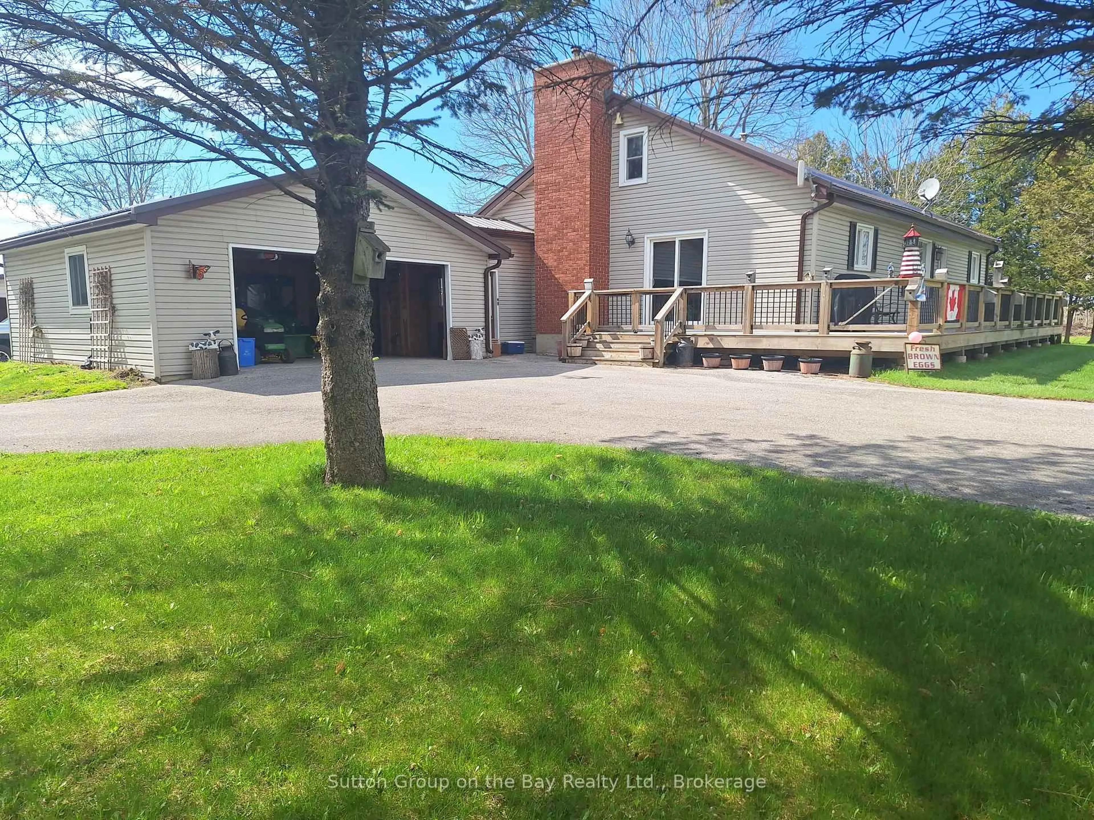 A pic from outside/outdoor area/front of a property/back of a property/a pic from drone, street for 10364 County Road 10 Highway, Clearview Ontario L0M 1N0
