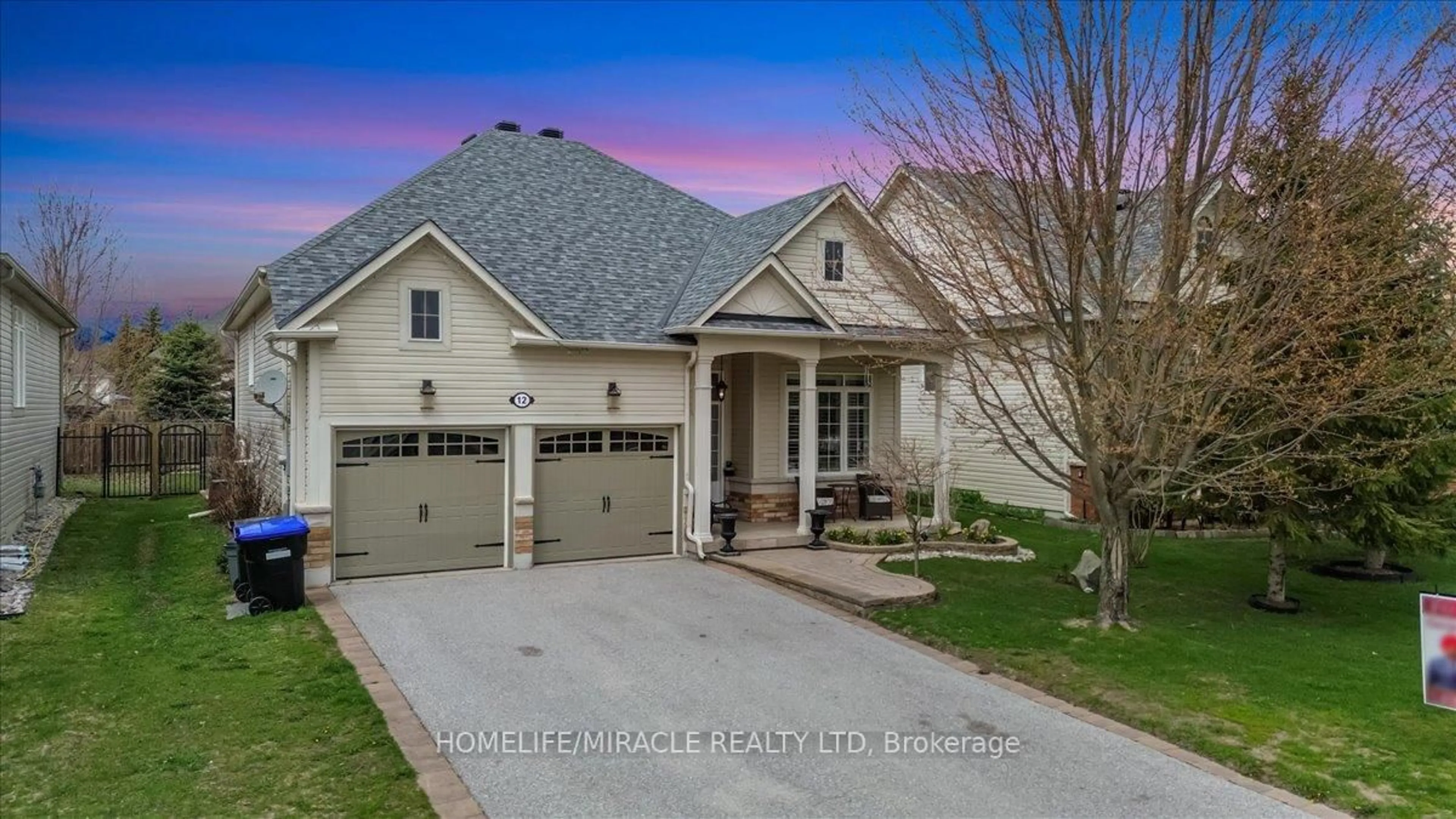 Home with brick exterior material, street for 12 Broadpoint St, Wasaga Beach Ontario L9Z 3B8