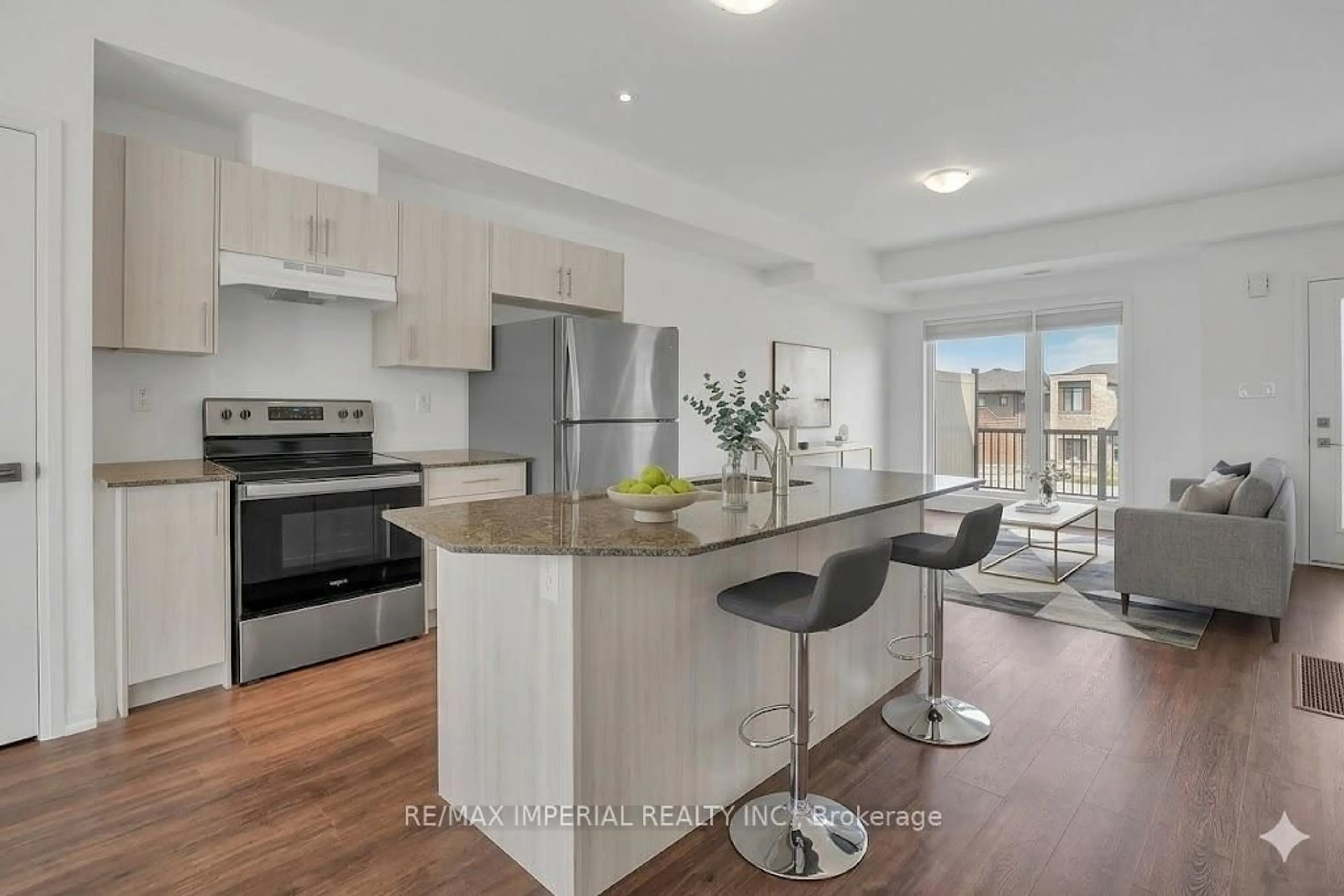 Open concept kitchen, wood/laminate floor for 61 Fairlane Ave, Barrie Ontario L9J 0N1