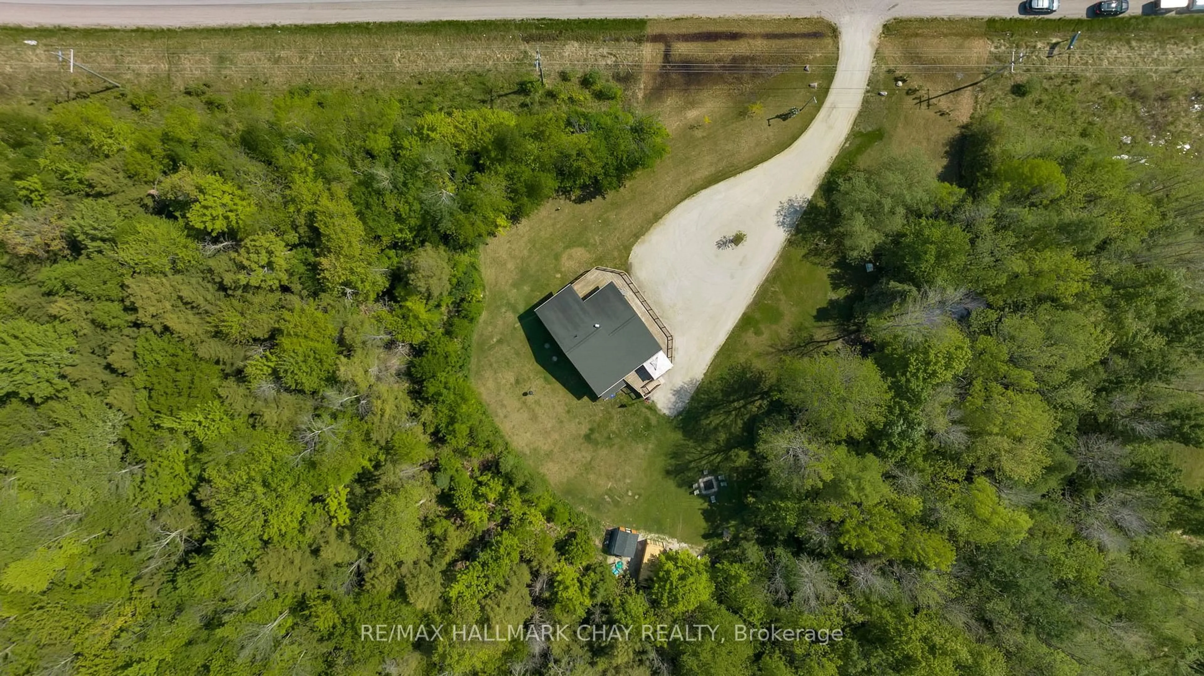 A pic from outside/outdoor area/front of a property/back of a property/a pic from drone, unknown for 13790 County 27 Rd, Springwater Ontario L0L 2K0