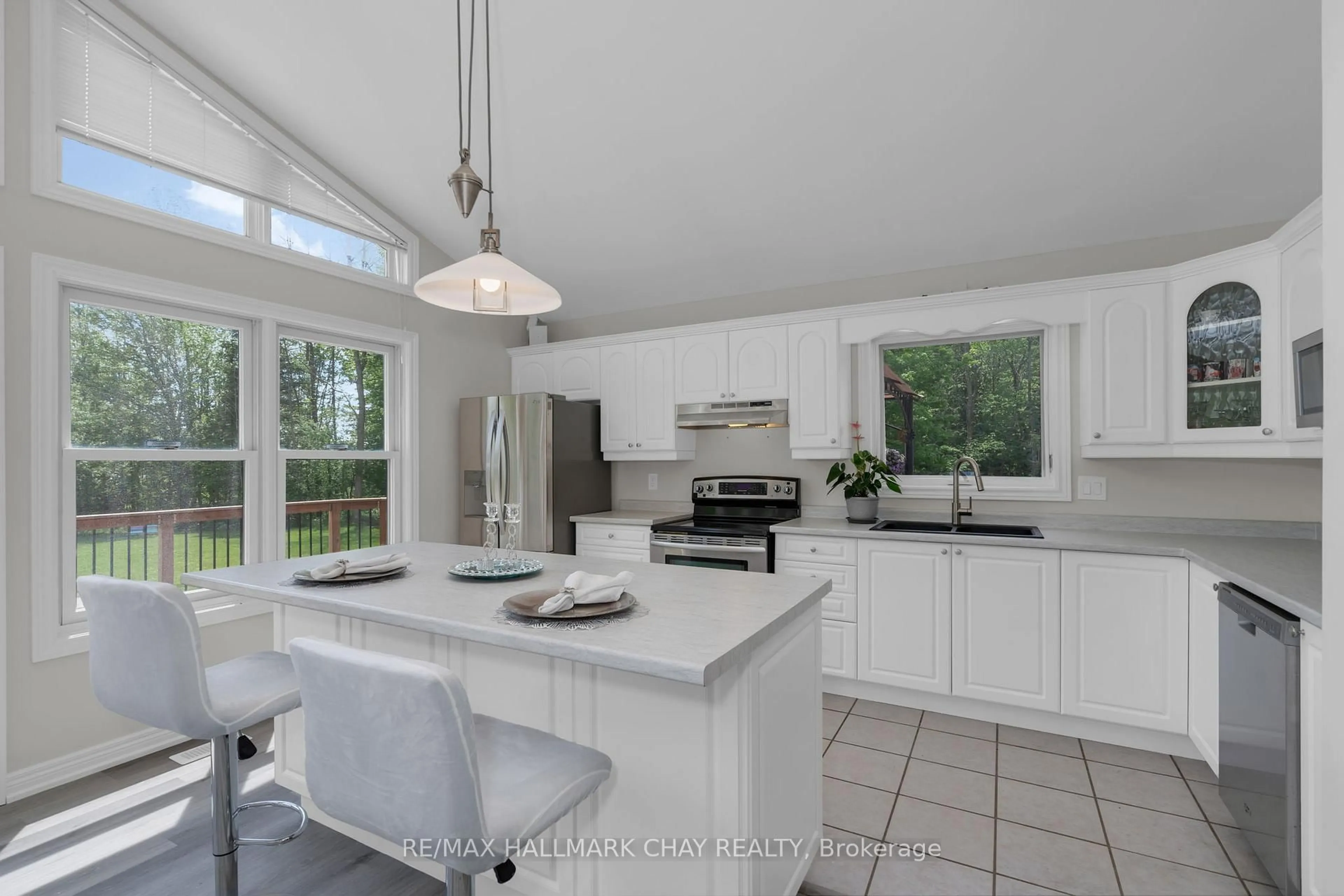 Open concept kitchen, ceramic/tile floor for 13790 County 27 Rd, Springwater Ontario L0L 2K0