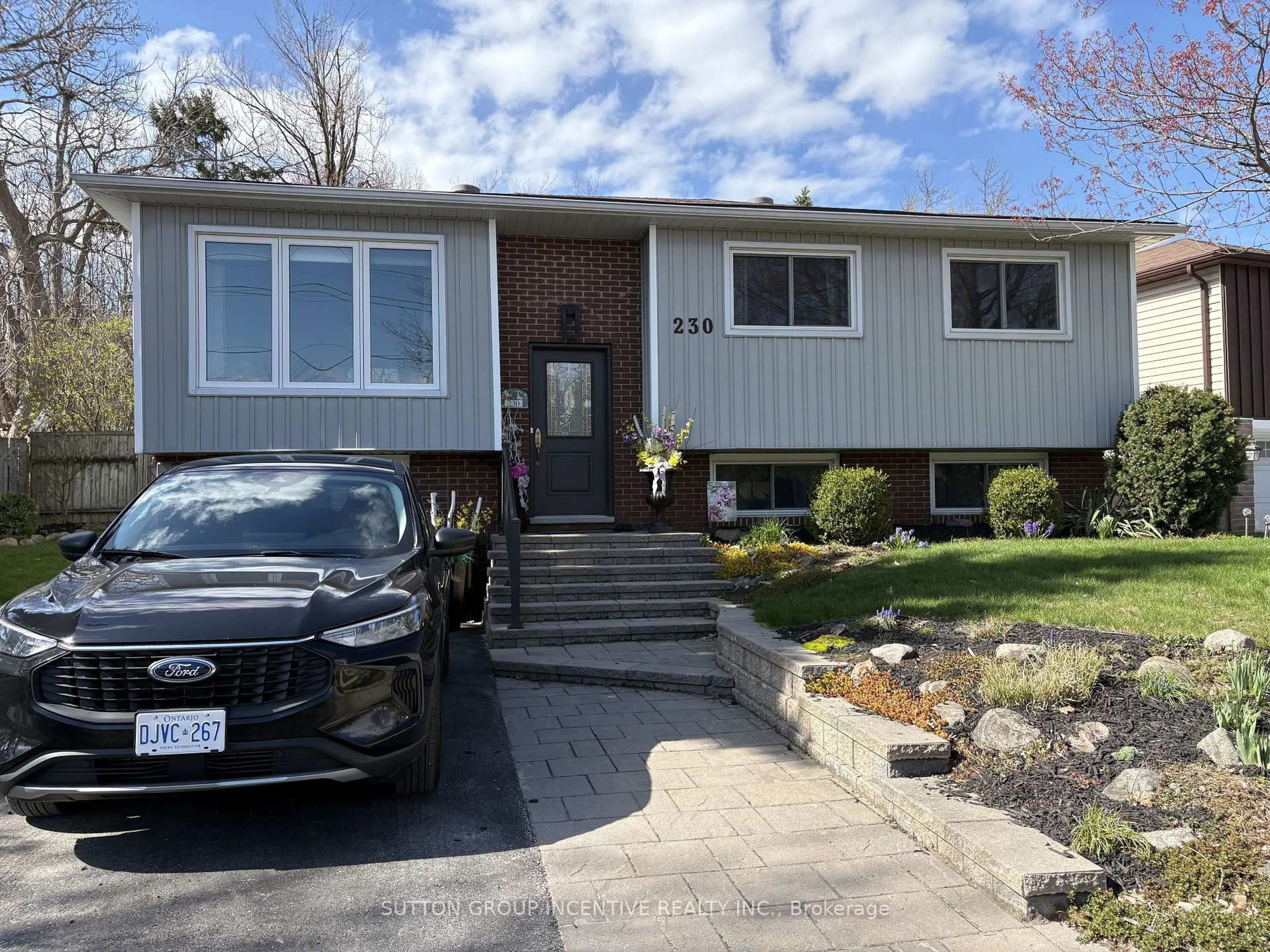 Home with vinyl exterior material, street for 230 Edgehill Dr, Barrie Ontario L4N 7X1