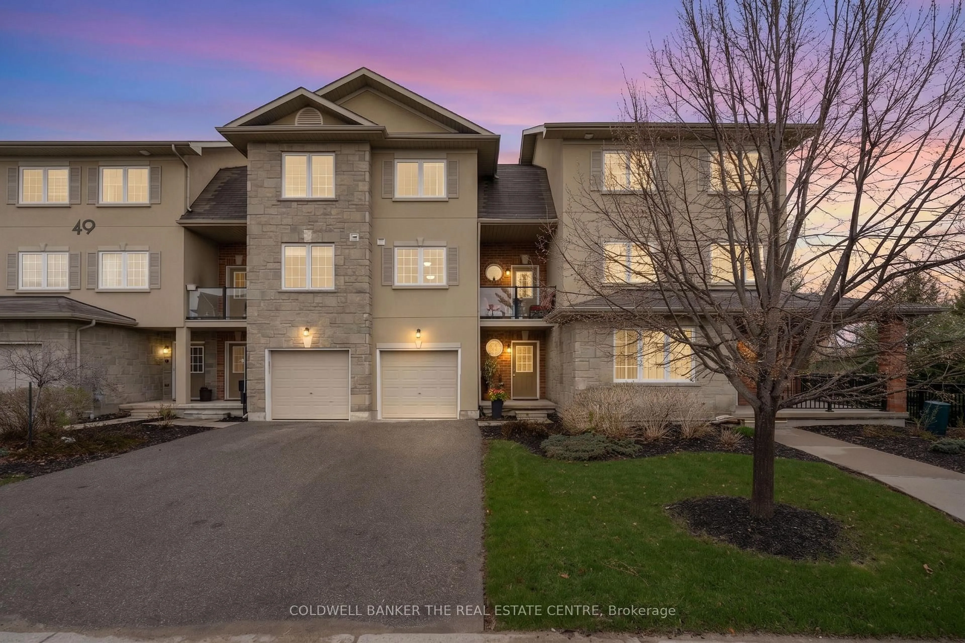 A pic from outside/outdoor area/front of a property/back of a property/a pic from drone, street for 49 Ferndale Dr #7, Barrie Ontario L4N 5W9