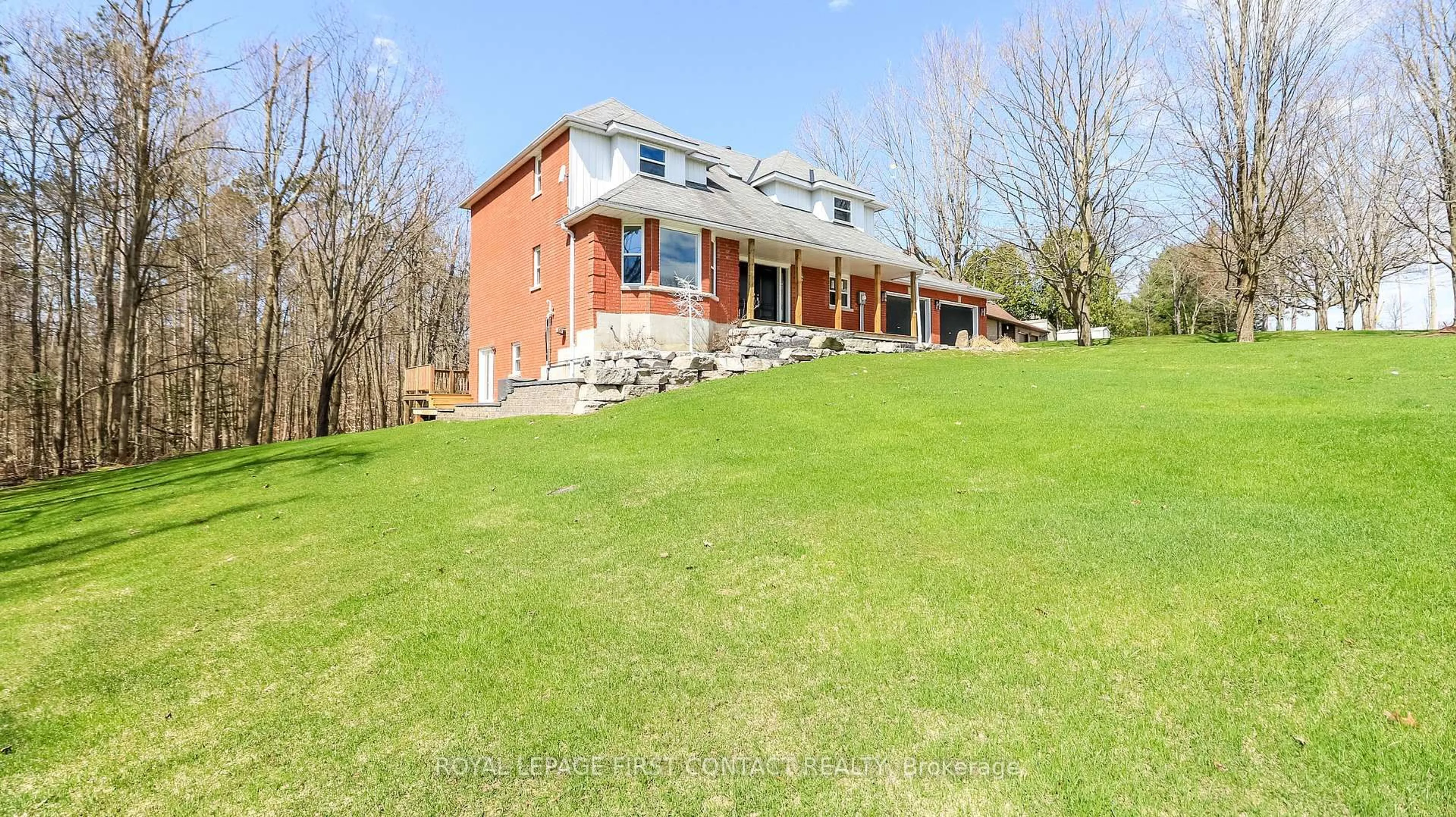 A pic from outside/outdoor area/front of a property/back of a property/a pic from drone, unknown for 602 Scarlett Line, Springwater Ontario L0L 1V0