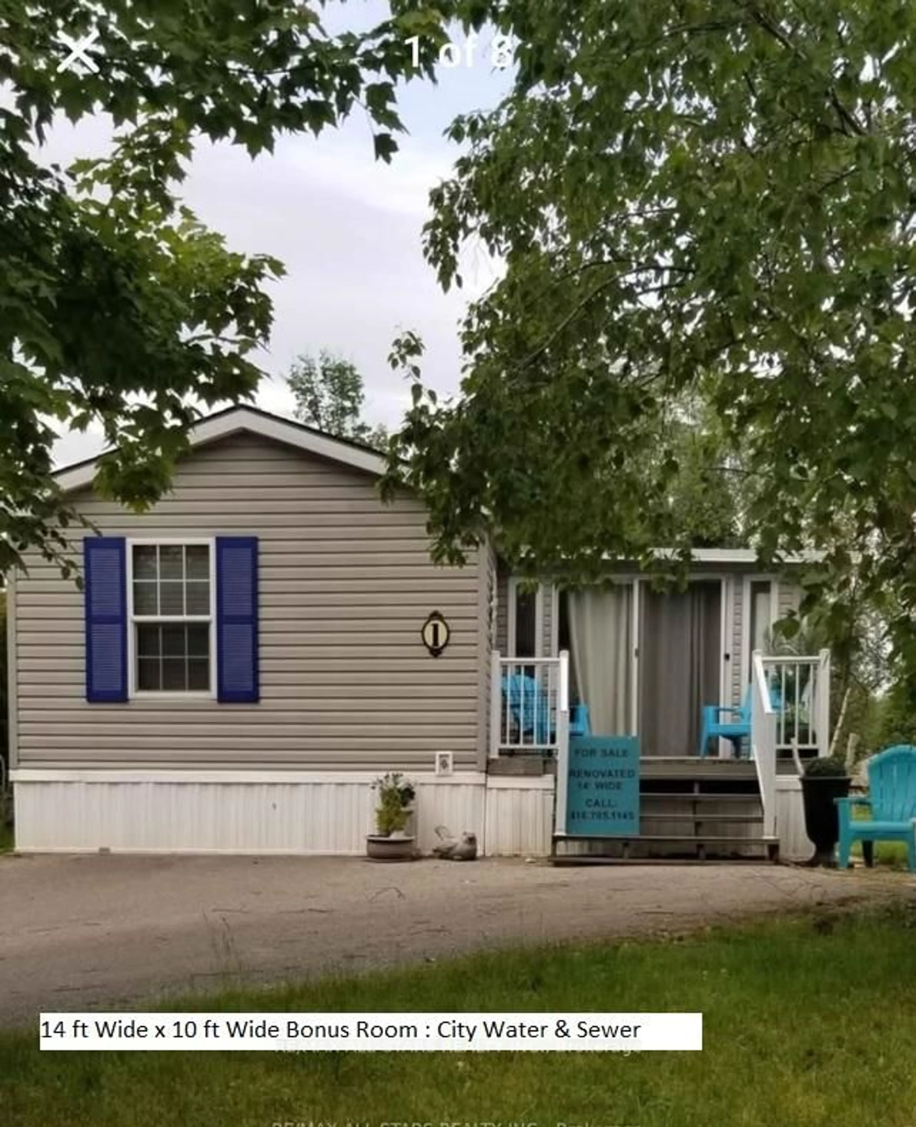 Home with vinyl exterior material, street for 1 KENORA Tr, Wasaga Beach Ontario L9Z 1X7