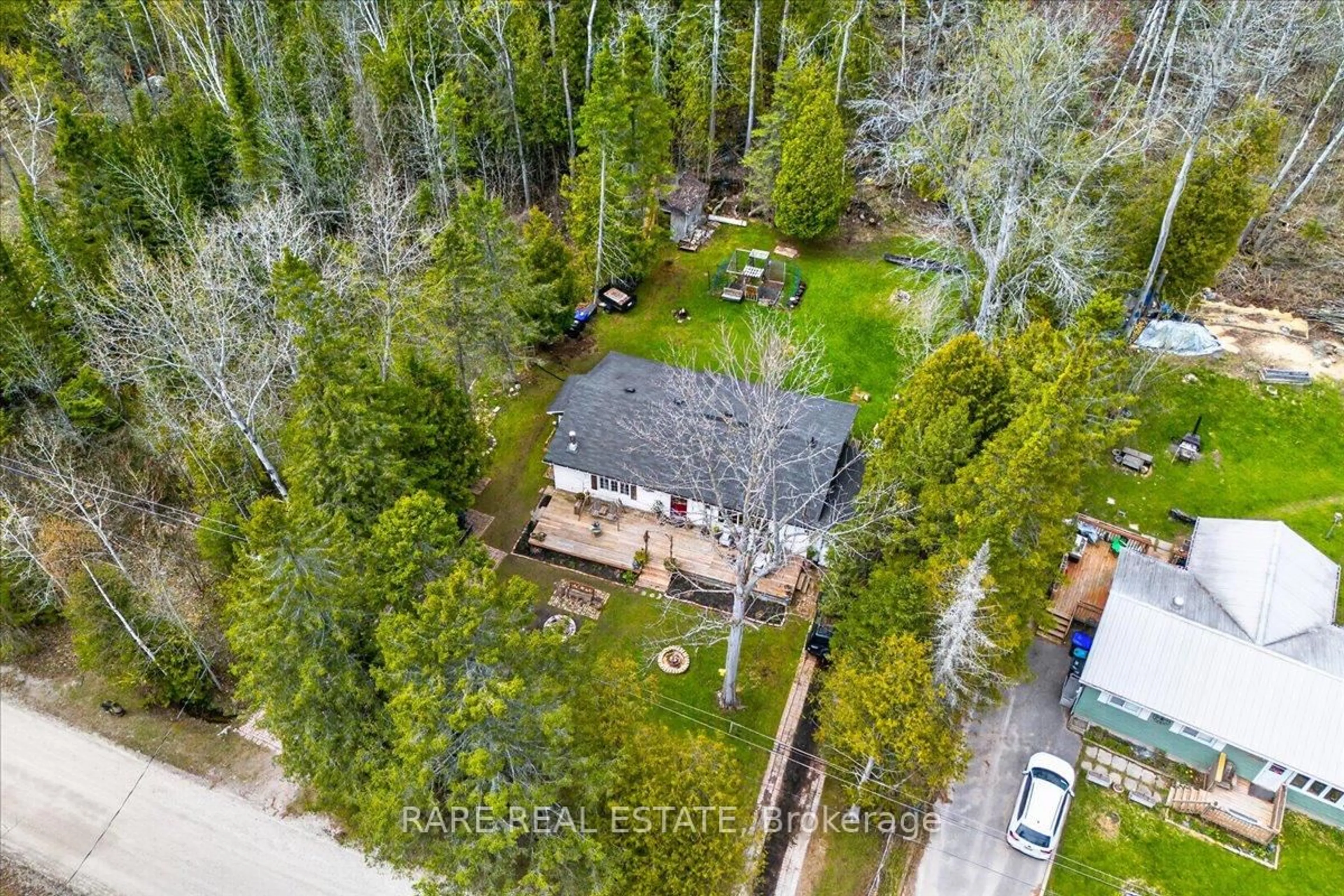 A pic from outside/outdoor area/front of a property/back of a property/a pic from drone, forest/trees view for 22 Balsam St, Tiny Ontario L0L 1P1