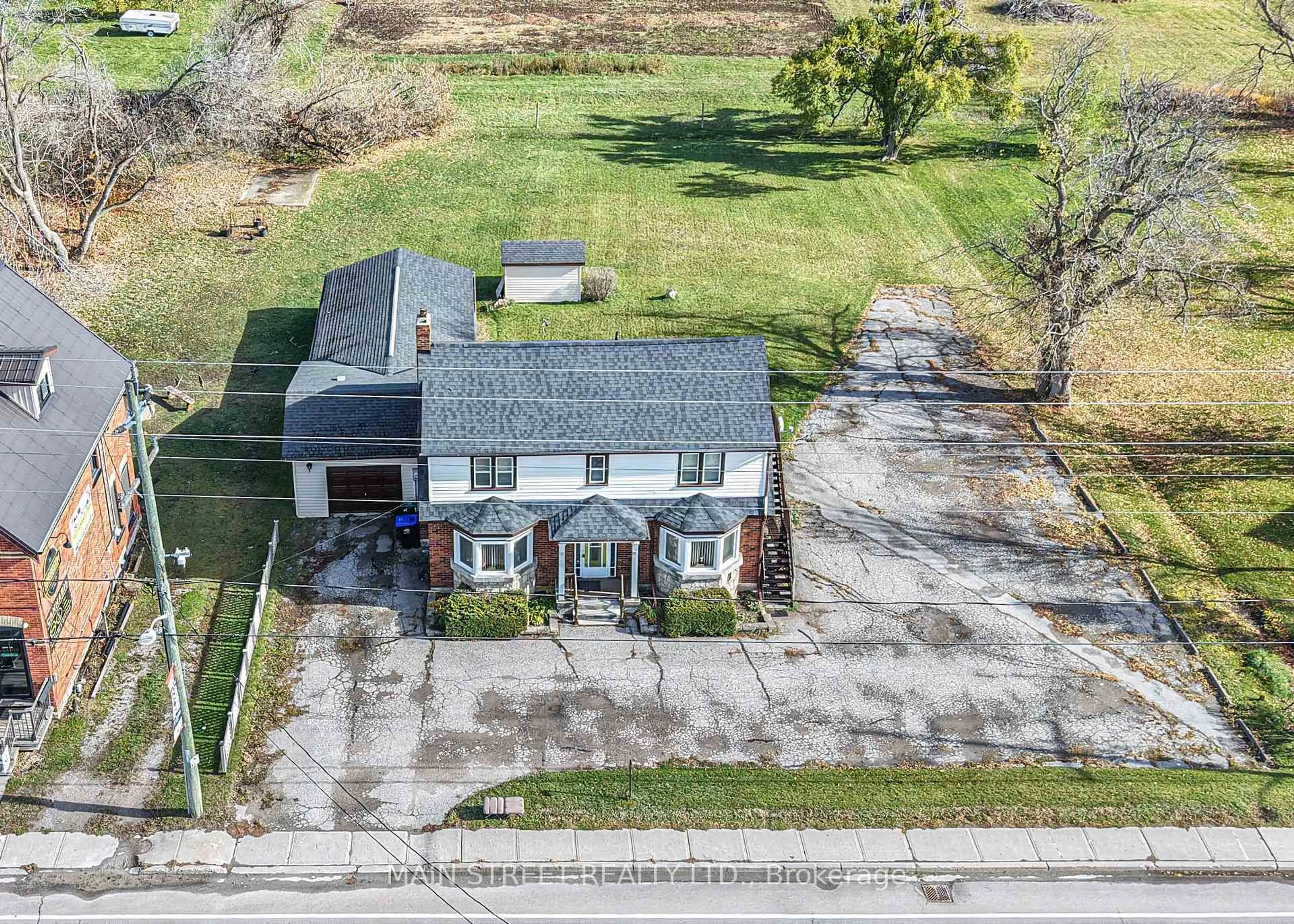 A pic from outside/outdoor area/front of a property/back of a property/a pic from drone, street for 2263 Hwy 12 Highway, Ramara Ontario L0K 1B0