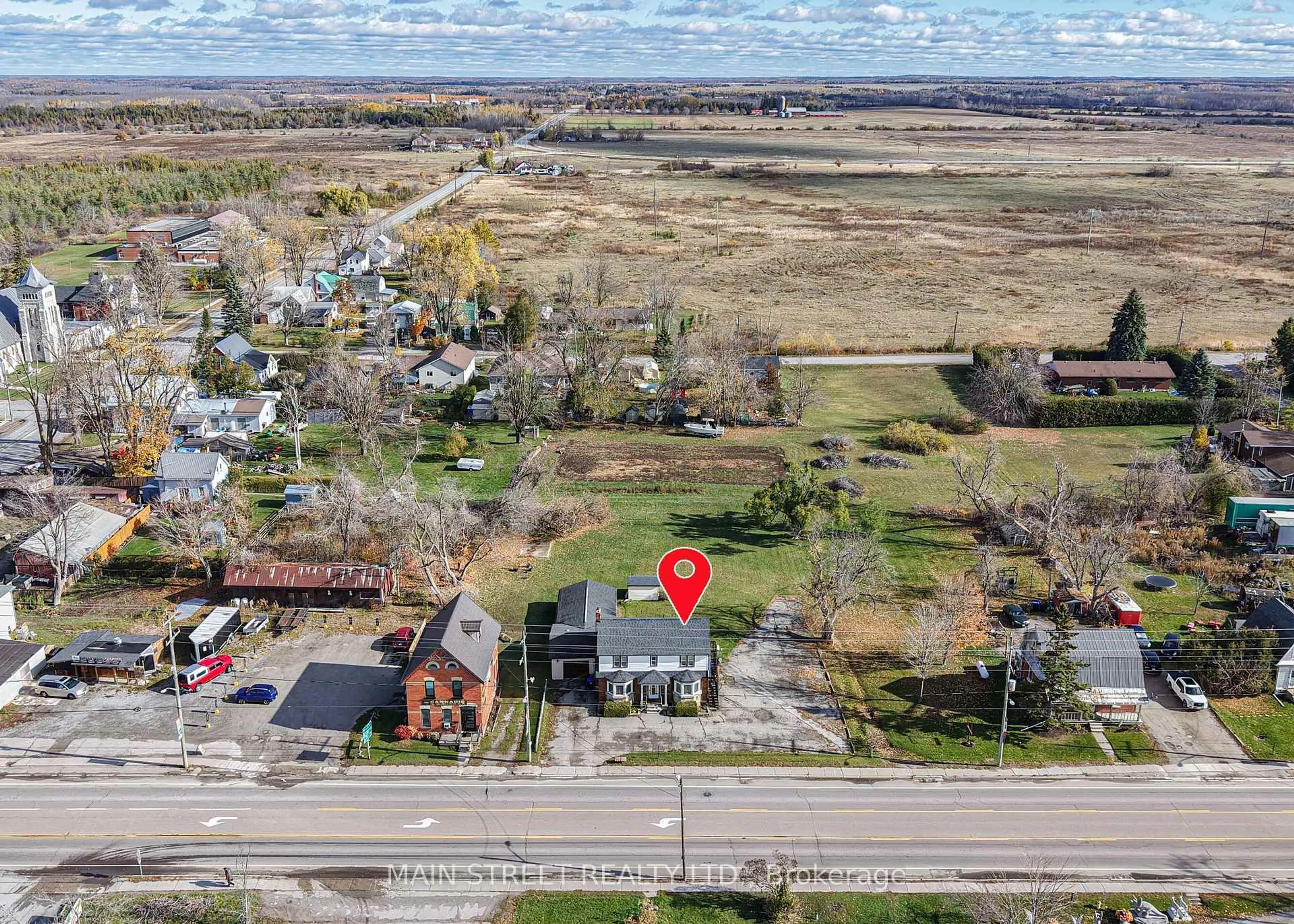 A pic from outside/outdoor area/front of a property/back of a property/a pic from drone, street for 2263 Hwy 12 Highway, Ramara Ontario L0K 1B0