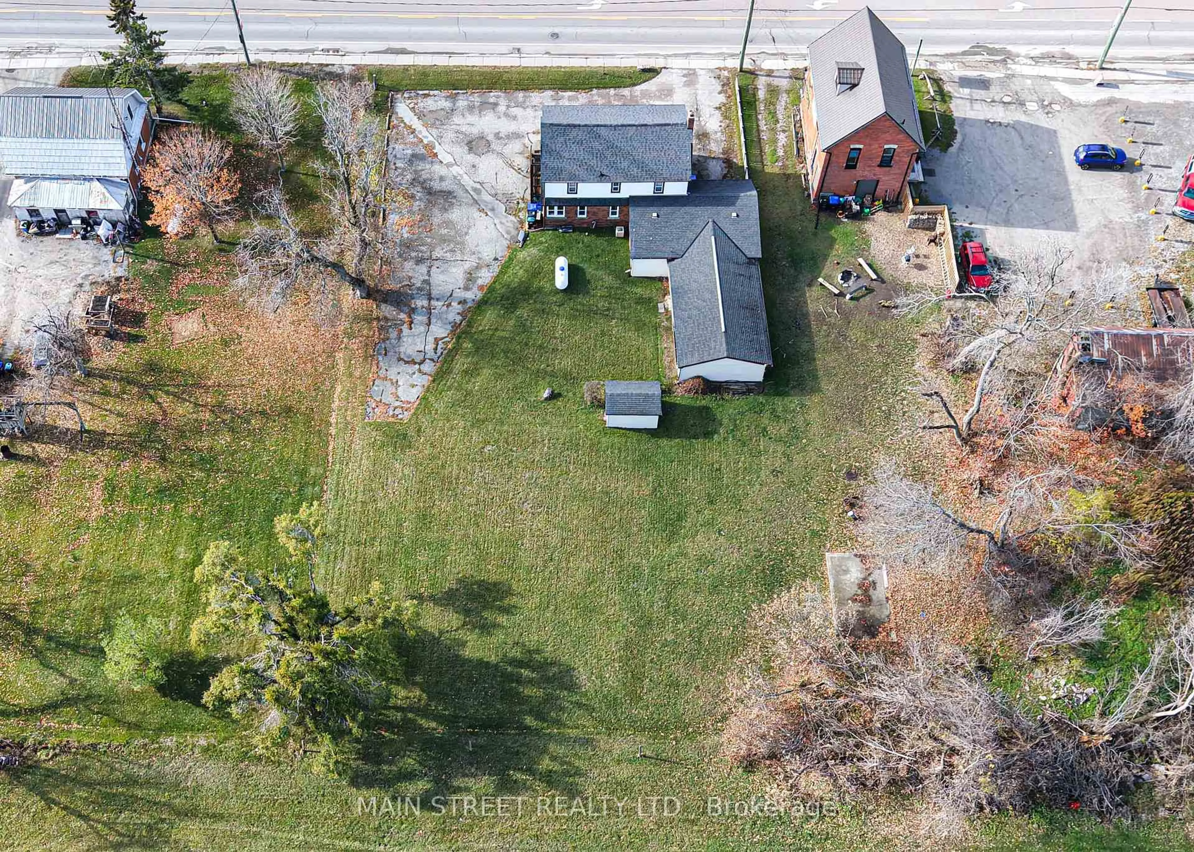 A pic from outside/outdoor area/front of a property/back of a property/a pic from drone, street for 2263 Hwy 12 Highway, Ramara Ontario L0K 1B0