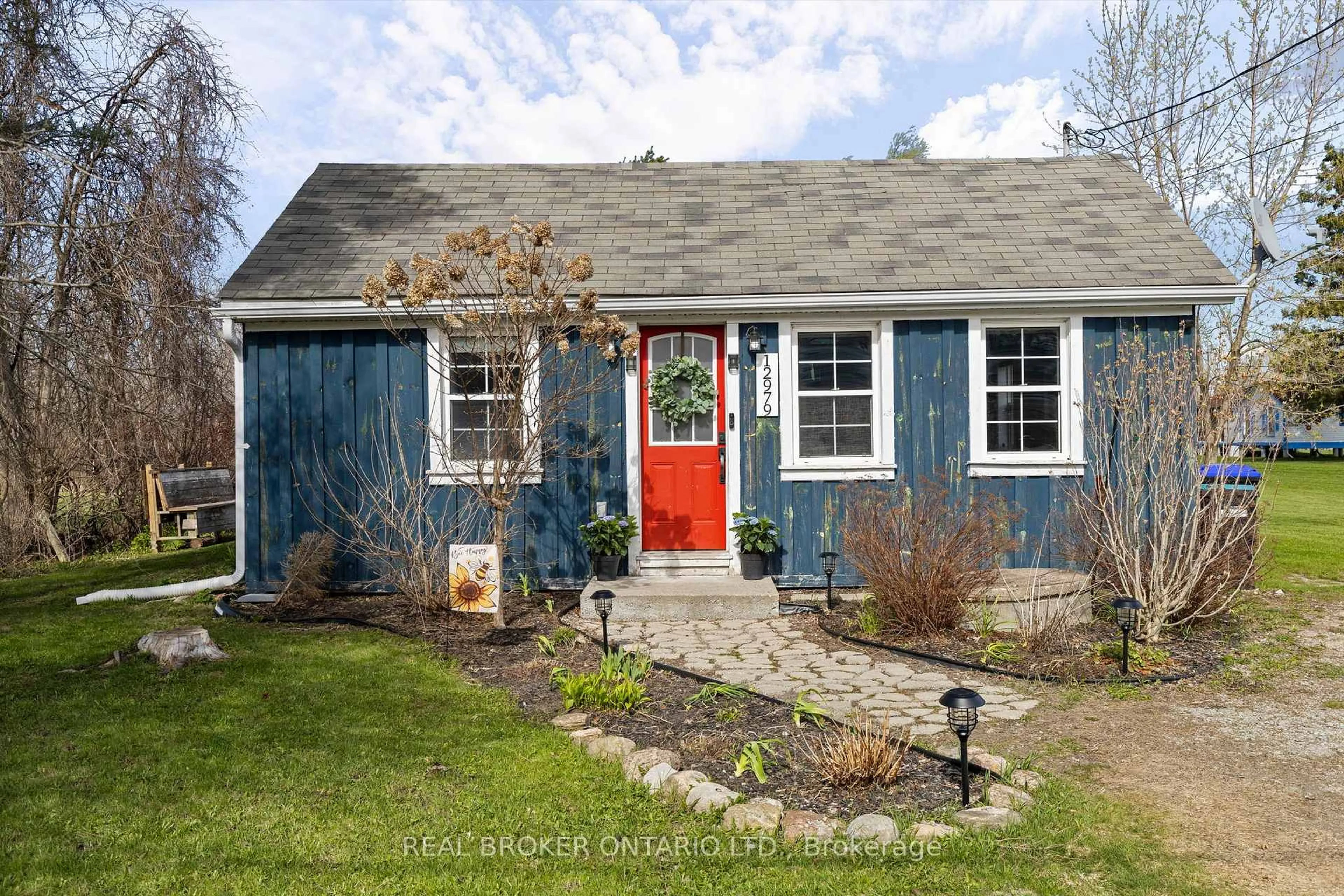 Home with vinyl exterior material, street for 12979 County 16 Rd, Severn Ontario L0K 2C0