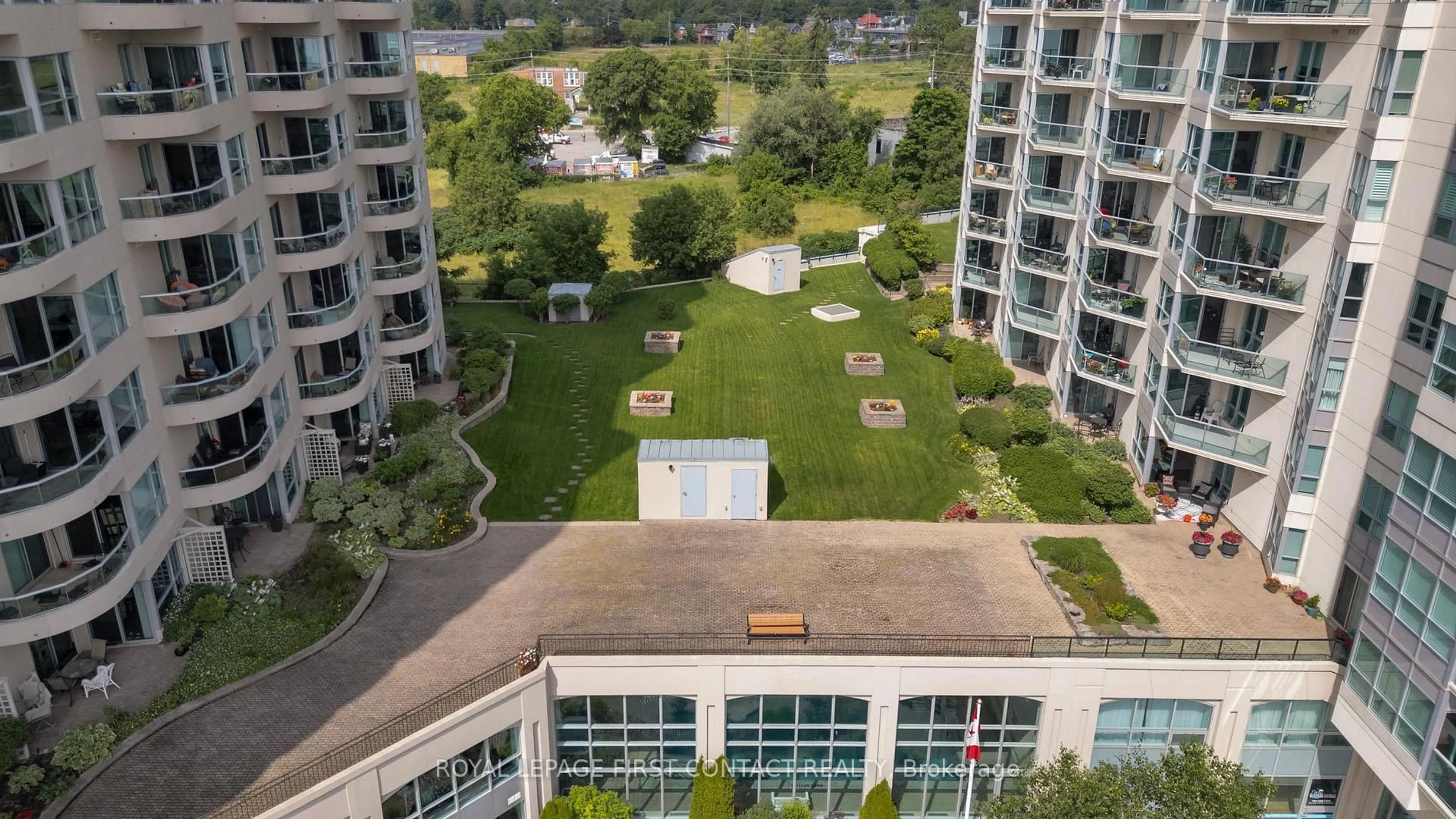 A pic from outside/outdoor area/front of a property/back of a property/a pic from drone, city buildings view from balcony for 6 Toronto St #1407, Barrie Ontario L4N 9R2