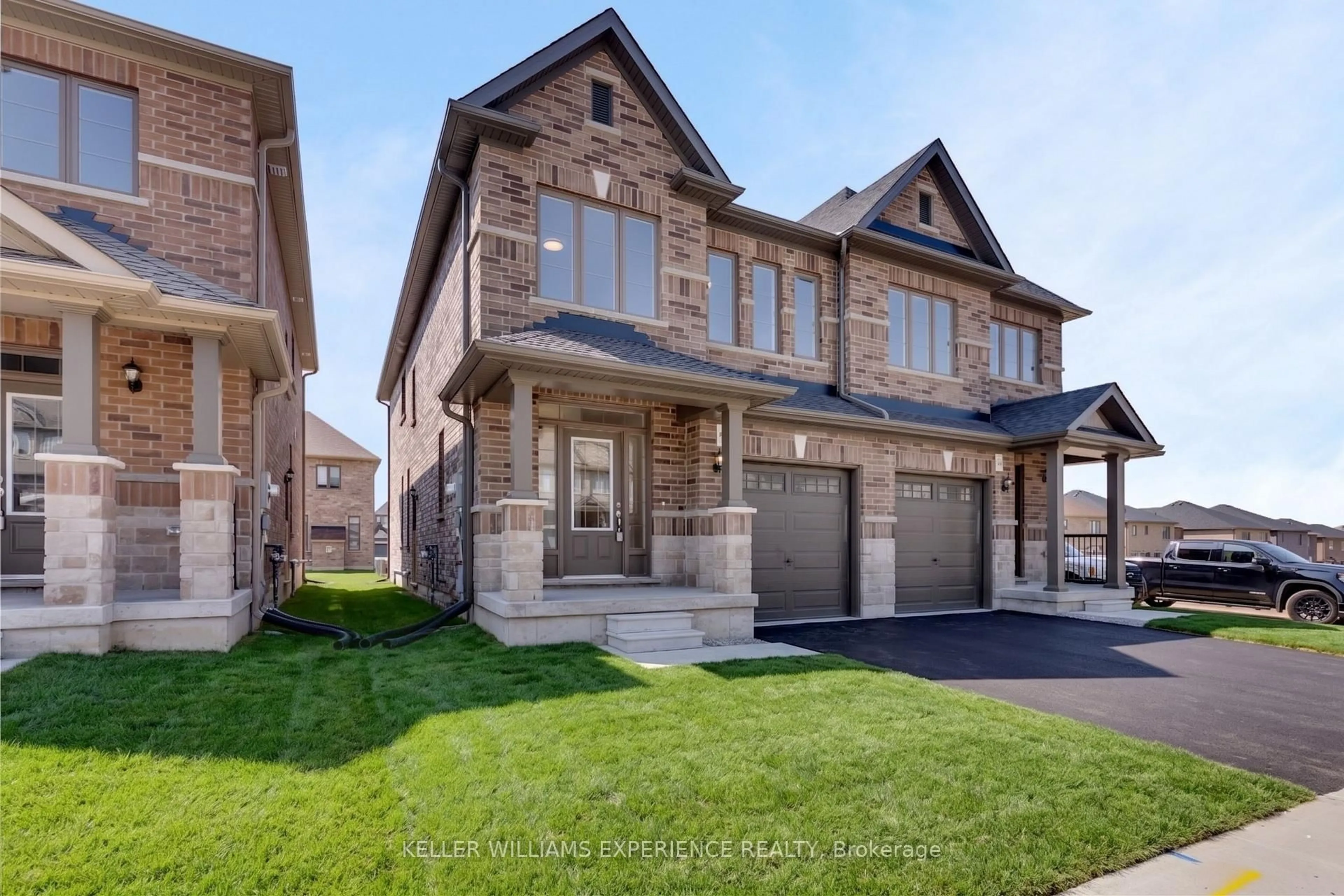 Home with brick exterior material, street for 54 Sagewood Ave, Barrie Ontario L9J 0K5