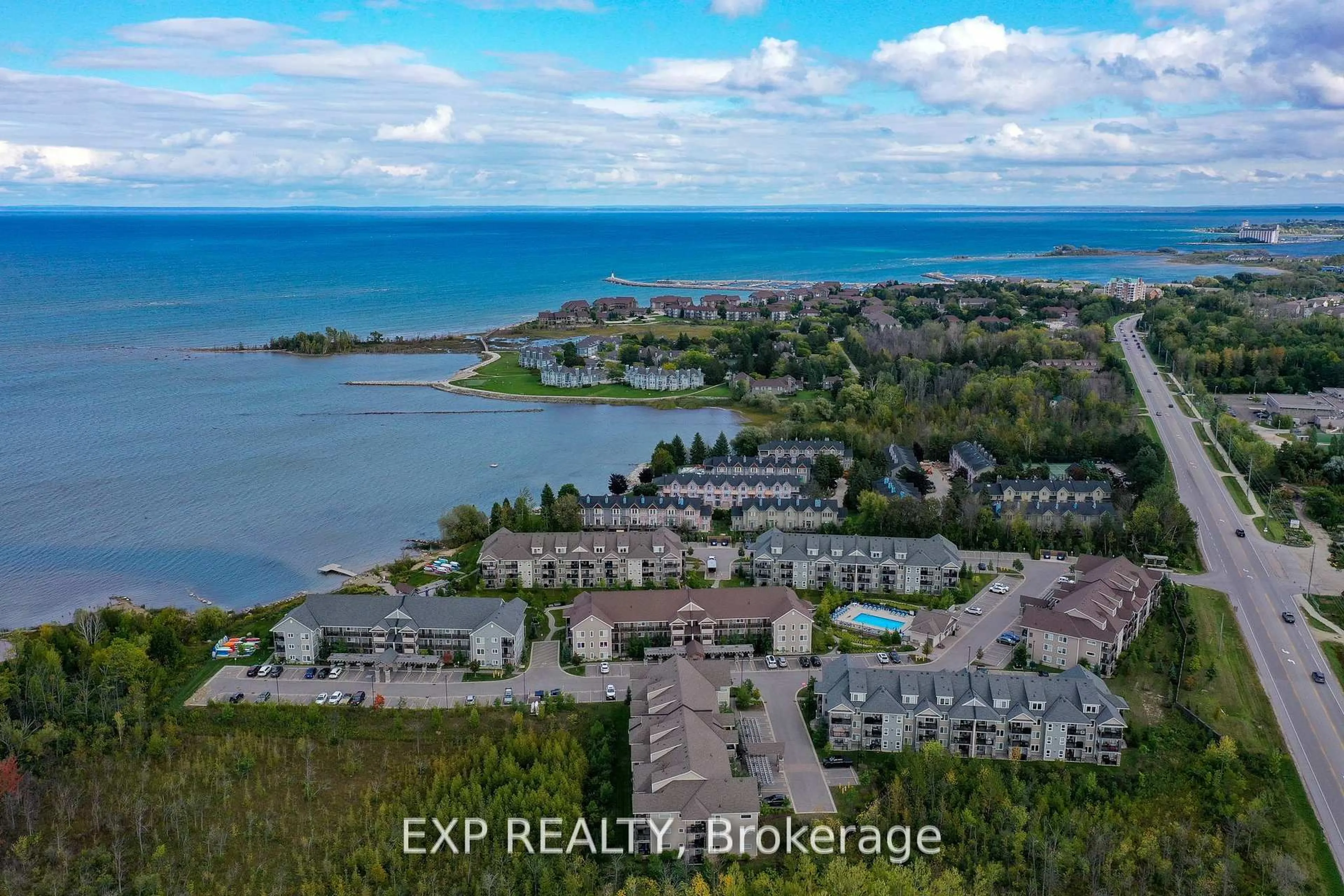 A pic from outside/outdoor area/front of a property/back of a property/a pic from drone, water/lake/river/ocean view for 5 Anchorage Cres #202, Collingwood Ontario L9Y 0Y6