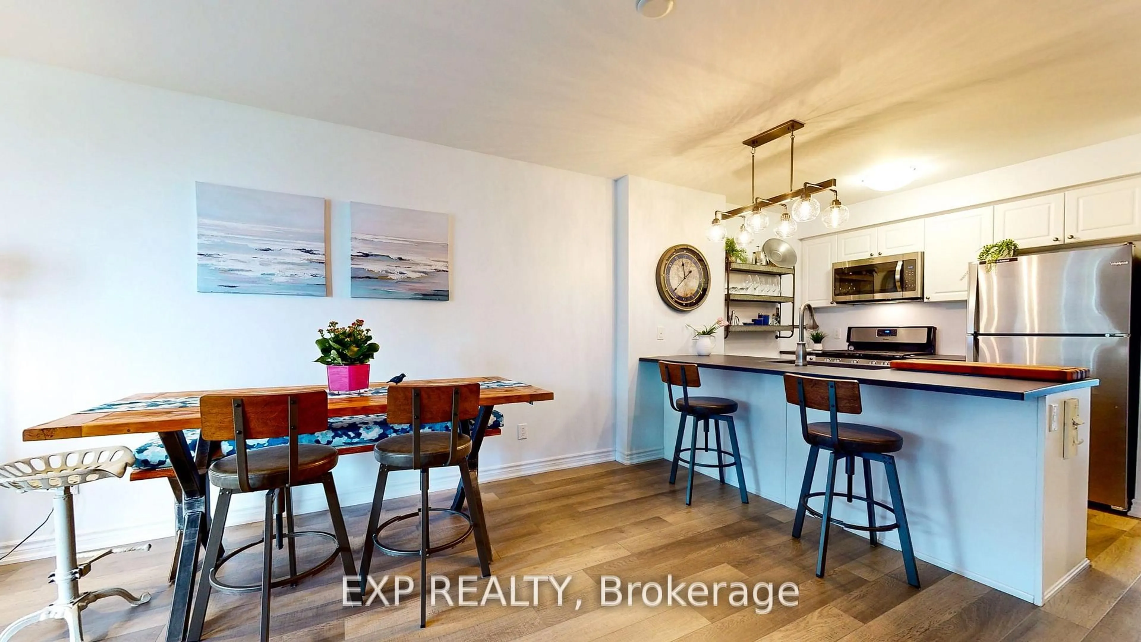 Open concept kitchen, wood/laminate floor for 5 Anchorage Cres #202, Collingwood Ontario L9Y 0Y6