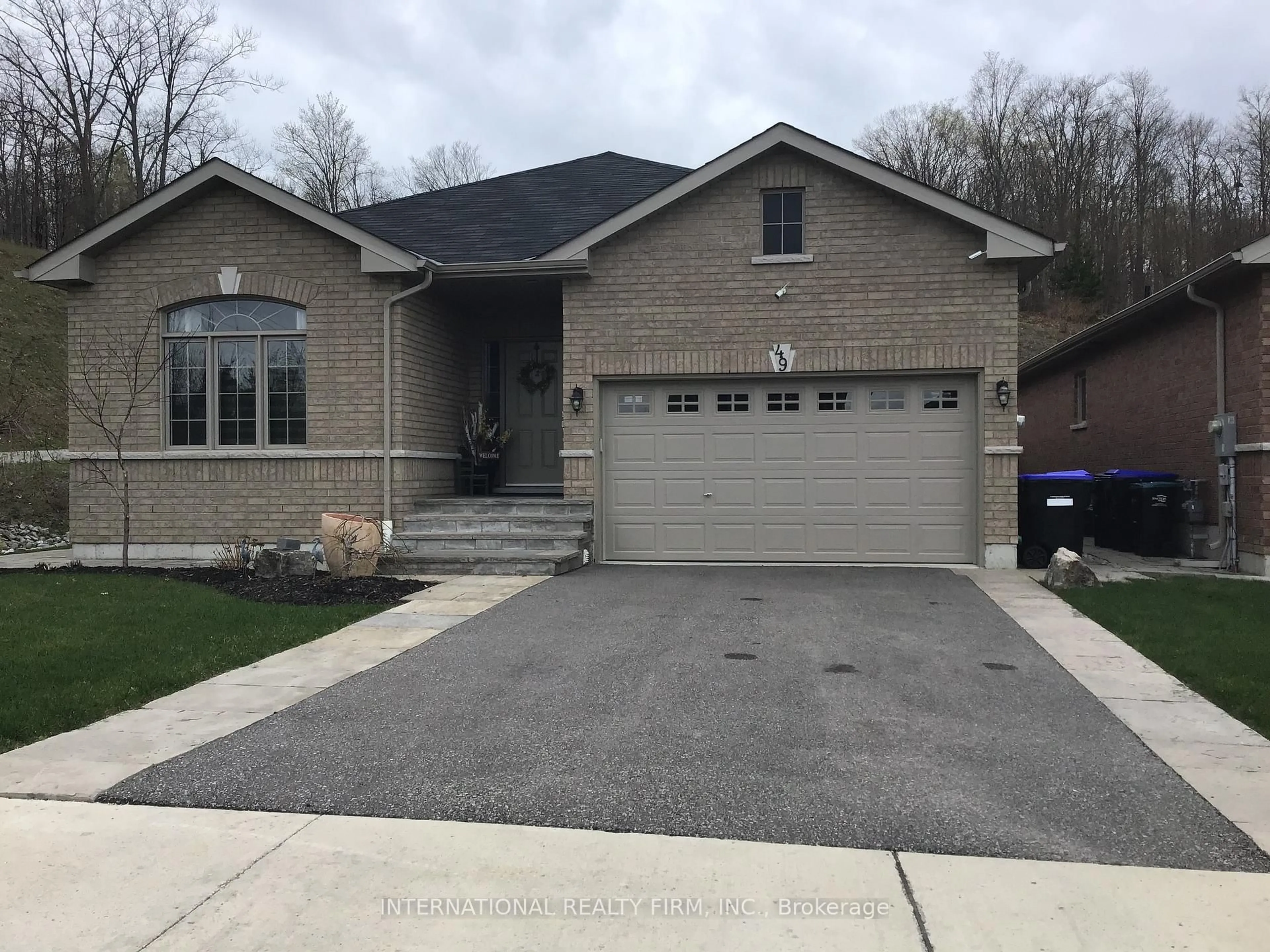 Home with brick exterior material, street for 49 Beausoleil Dr, Penetanguishene Ontario L9M 0V8