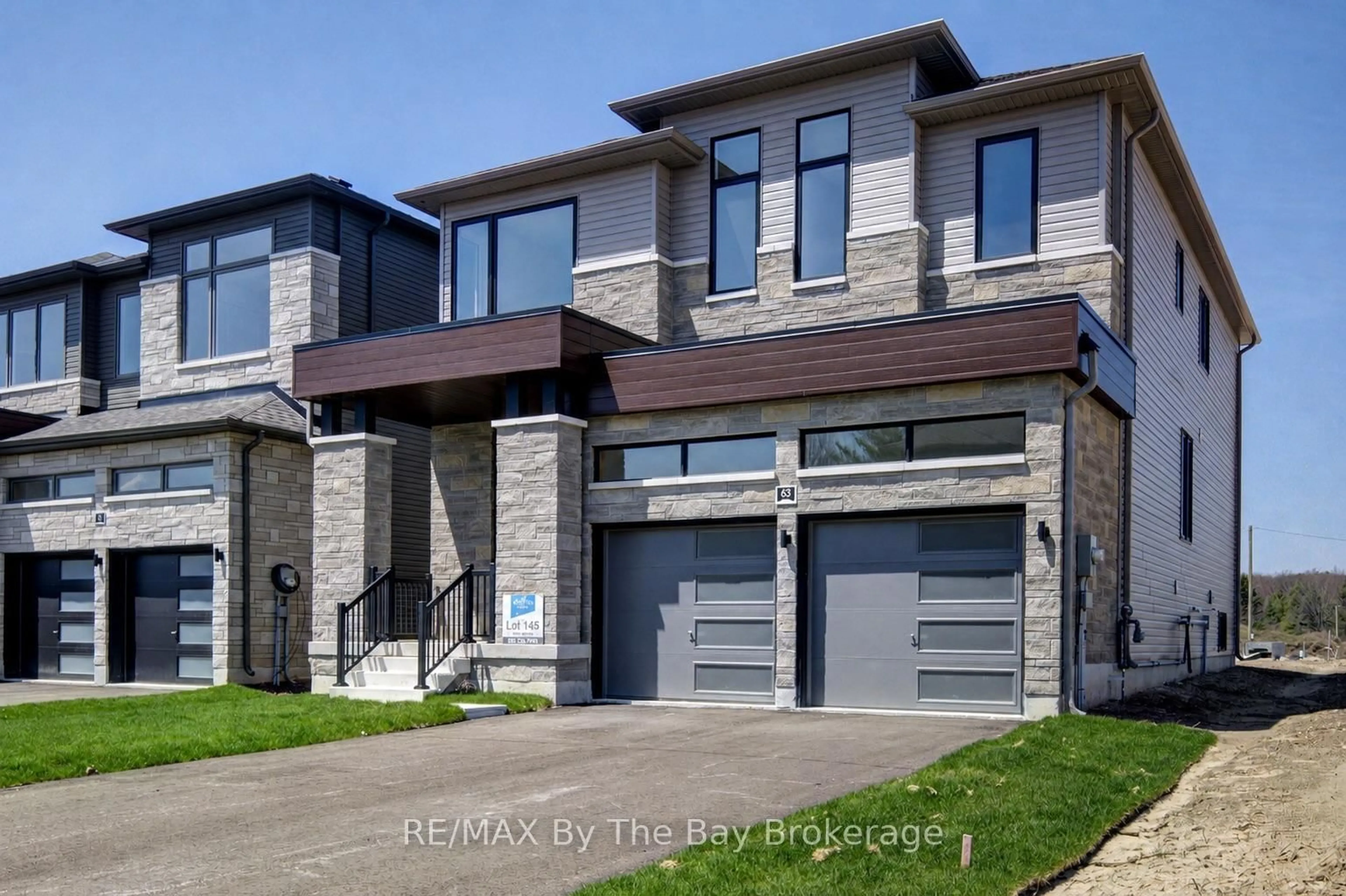 Home with brick exterior material, street for 63 Rosanne Circ, Wasaga Beach Ontario L9Z 0M8