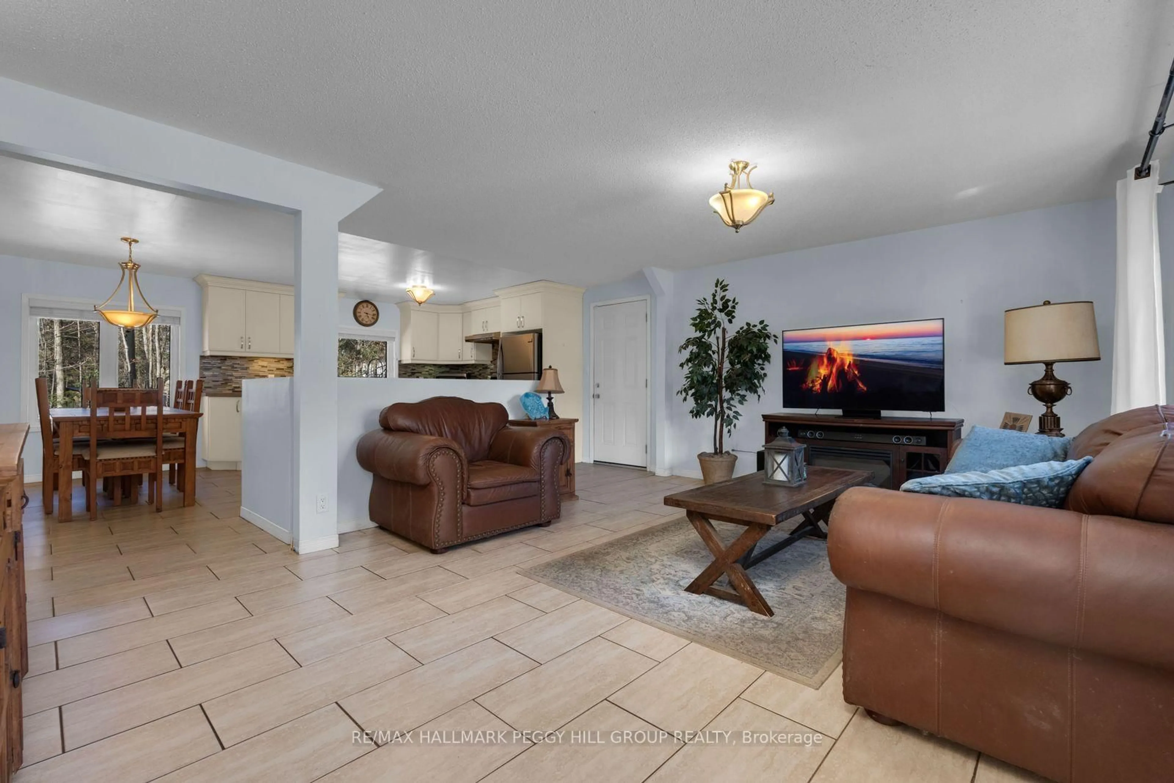 Living room with furniture, ceramic/tile floor for 144 Trout Lane, Tiny Ontario L9M 0J1
