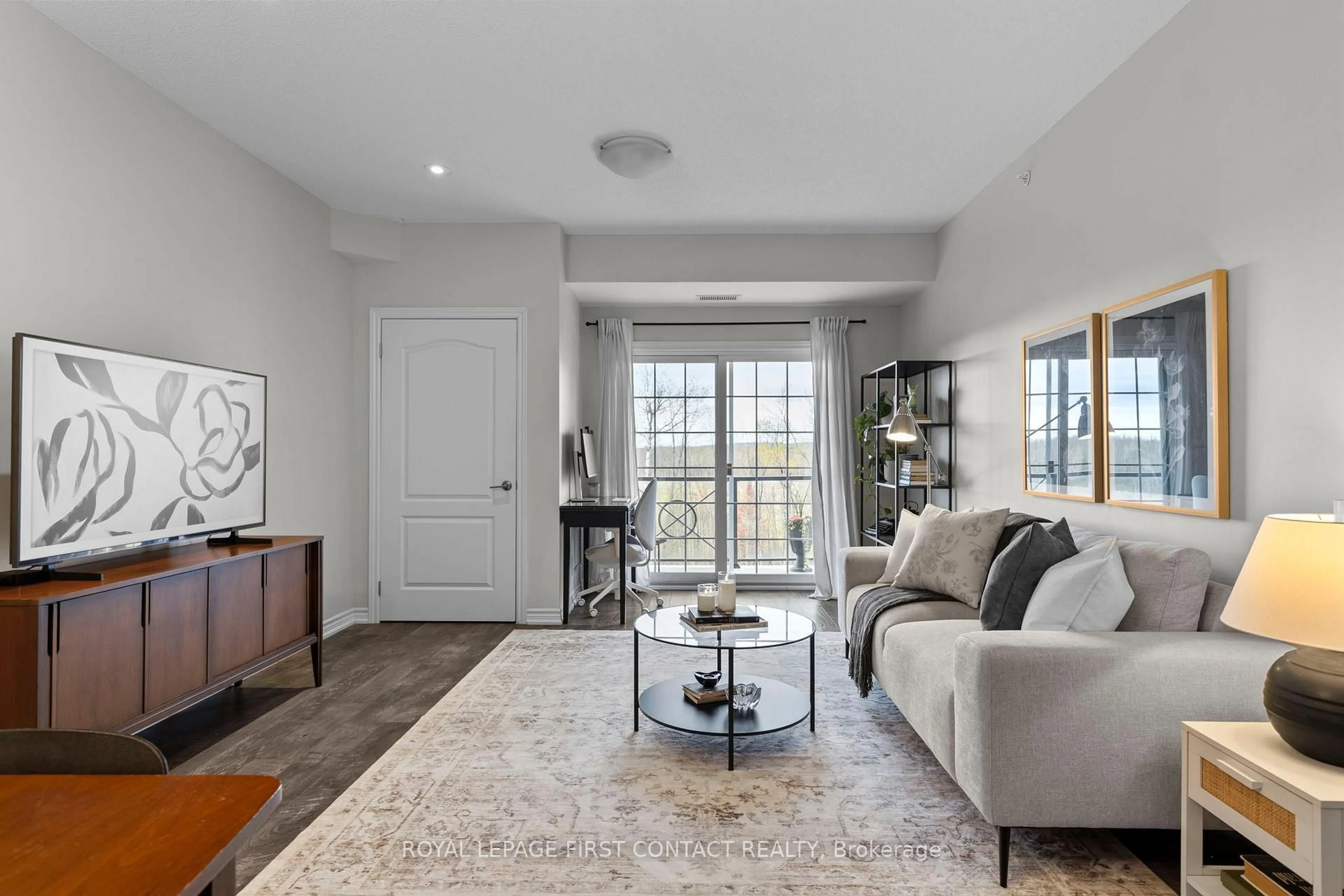 Living room with furniture, unknown for 42 Ferndale Dr #309, Barrie Ontario L4N 2M5
