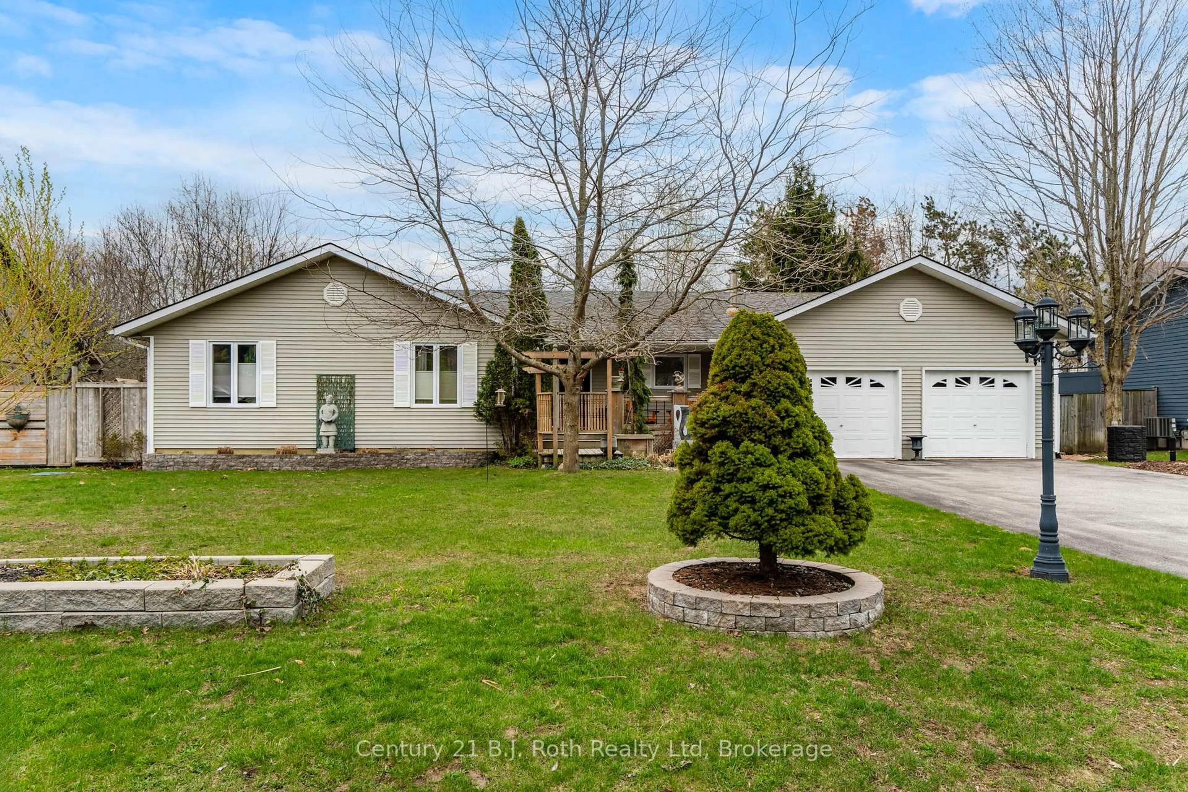 A pic from outside/outdoor area/front of a property/back of a property/a pic from drone, street for 59 Withall Grve, Tiny Ontario L0L 2T0