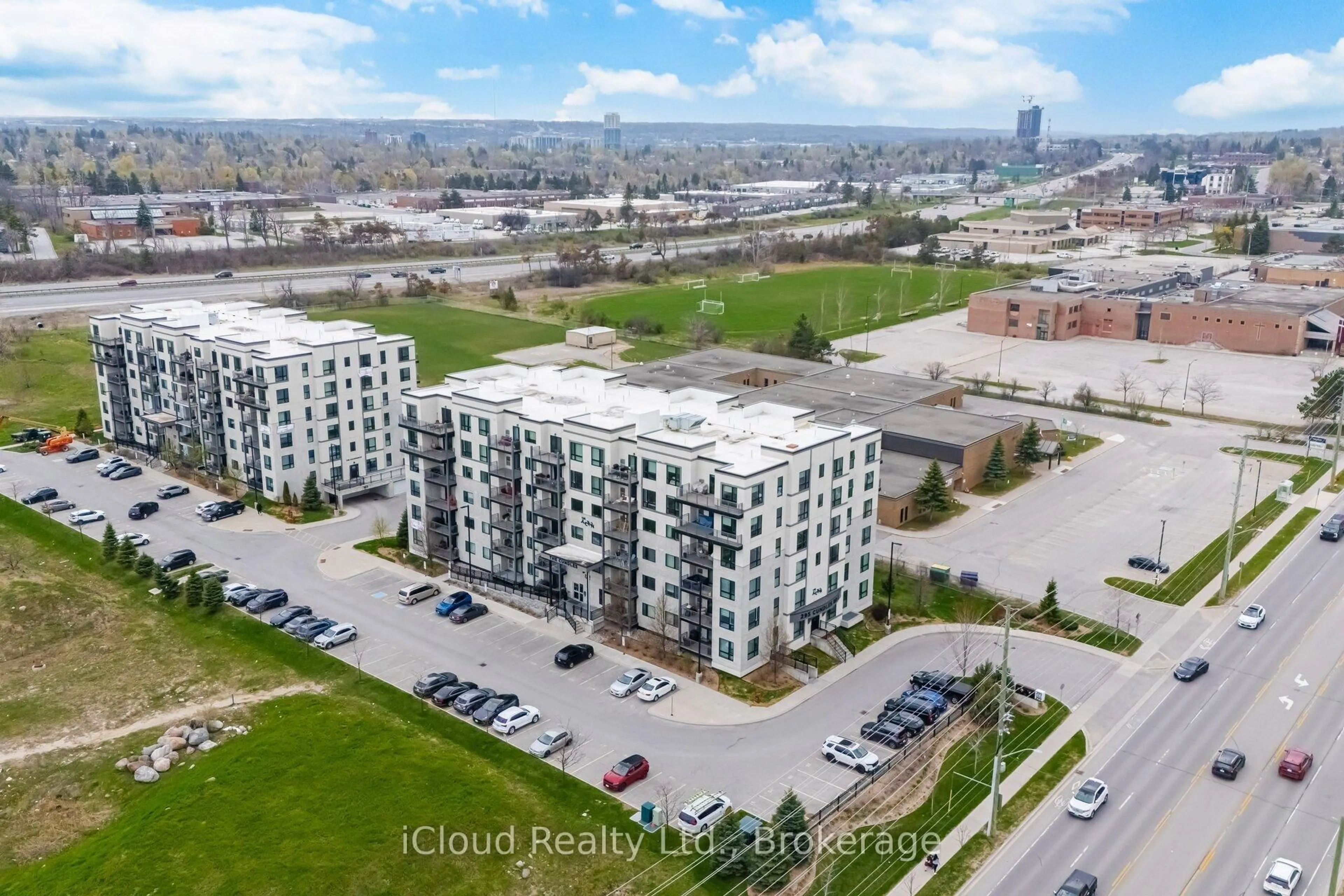A pic from outside/outdoor area/front of a property/back of a property/a pic from drone, city buildings view from balcony for 295 Cundles Rd #208, Barrie Ontario L4M 0K8