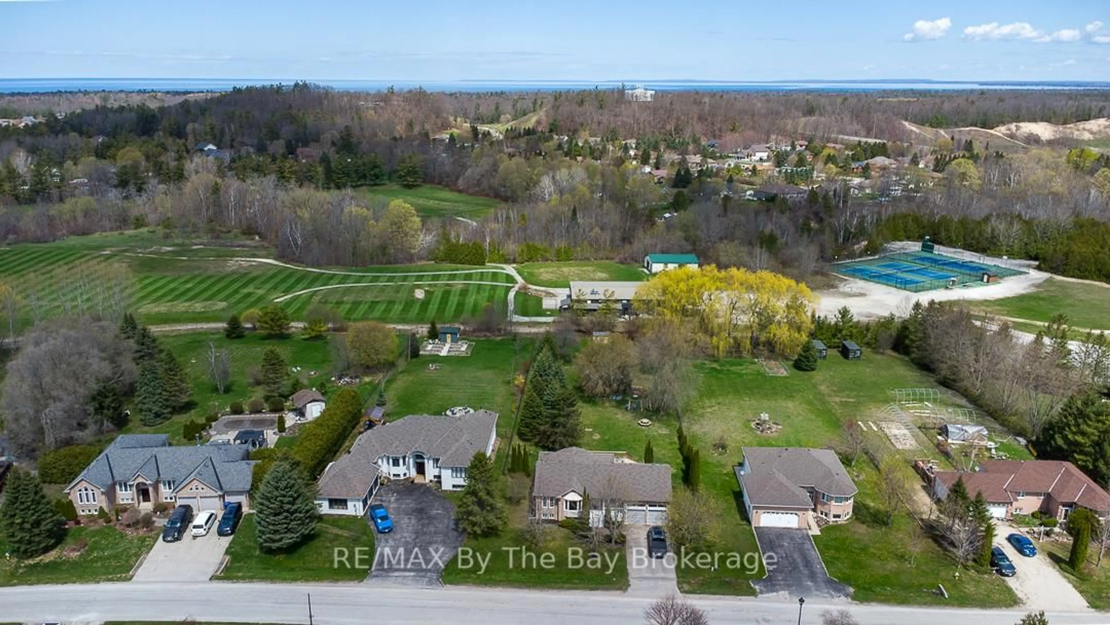 A pic from outside/outdoor area/front of a property/back of a property/a pic from drone, water/lake/river/ocean view for 10 Lamont Creek Dr, Wasaga Beach Ontario L9Z 1J8
