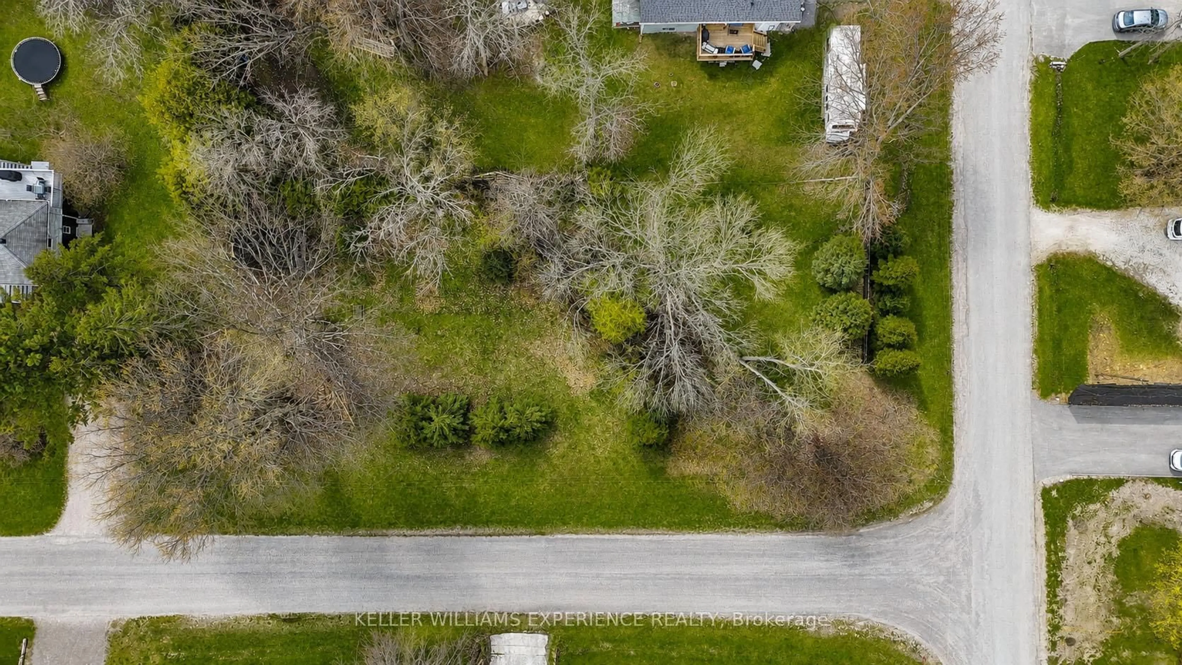 A pic from outside/outdoor area/front of a property/back of a property/a pic from drone, street for 6 Slemish Ave, Springwater Ontario L0L 2K0