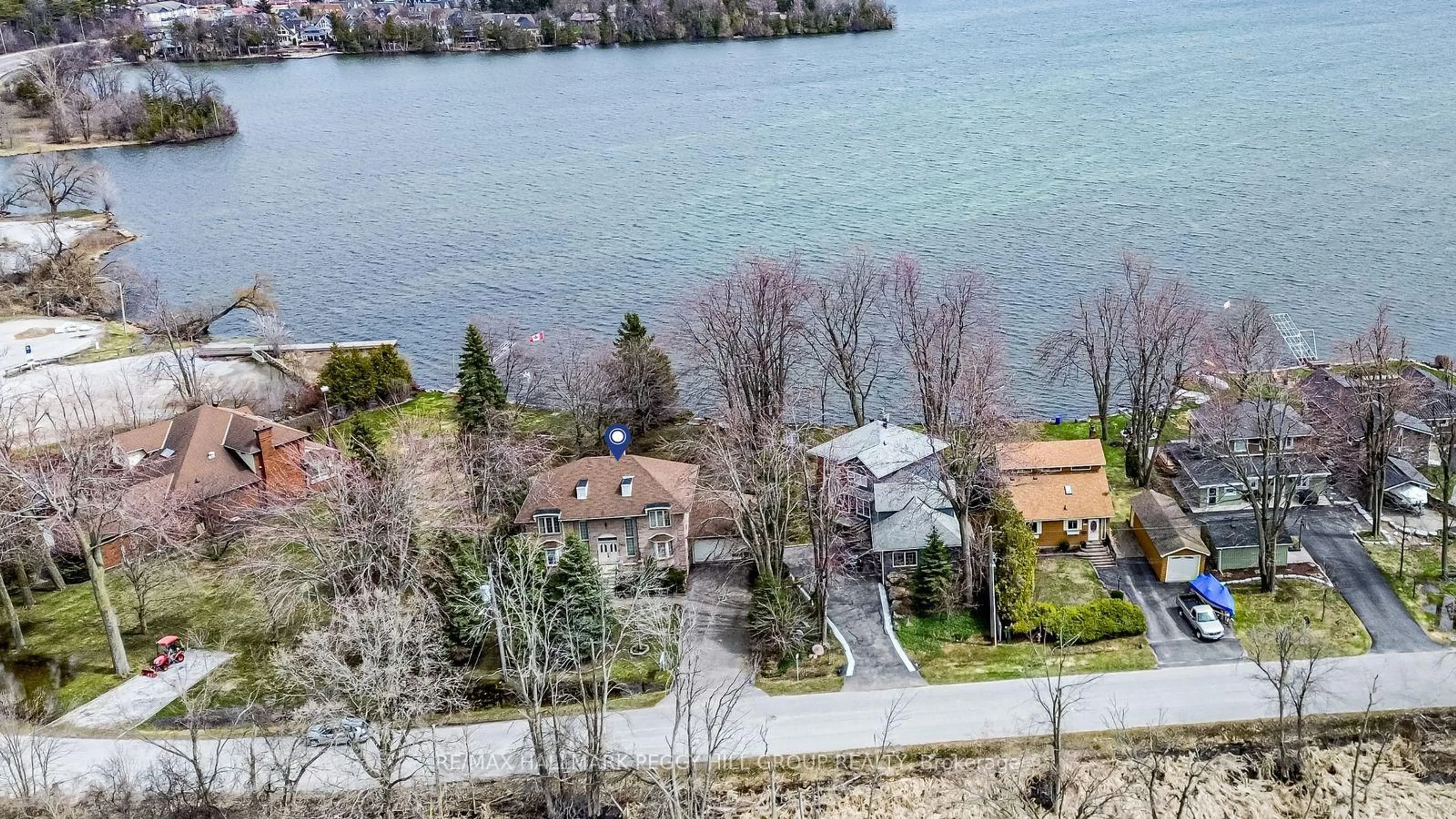 A pic from outside/outdoor area/front of a property/back of a property/a pic from drone, water/lake/river/ocean view for 395 Collins Dr, Orillia Ontario L3V 1E6