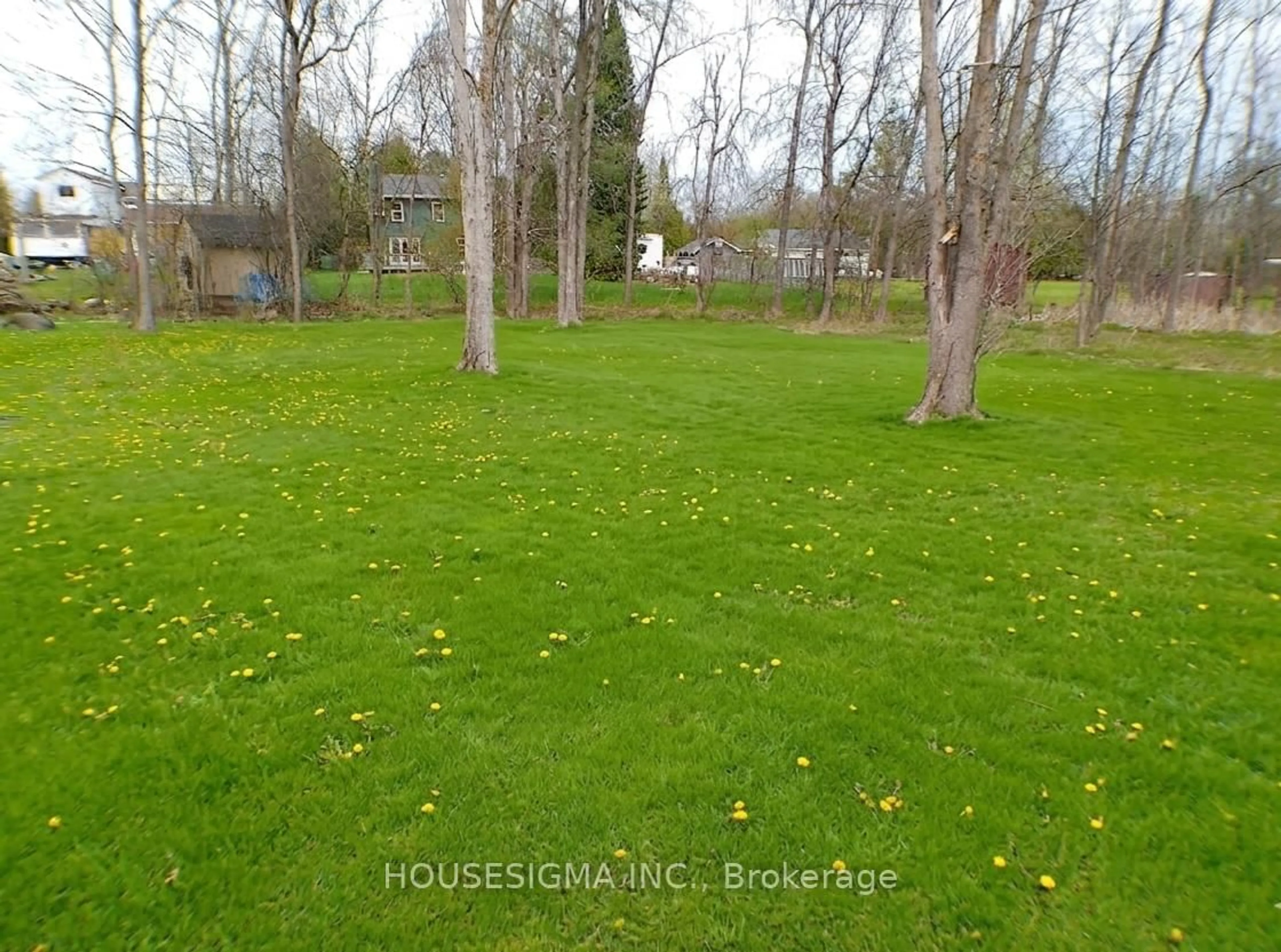 A pic from outside/outdoor area/front of a property/back of a property/a pic from drone, forest/trees view for 8892 Beachwood Rd, Wasaga Beach Ontario L9Z 2Y5