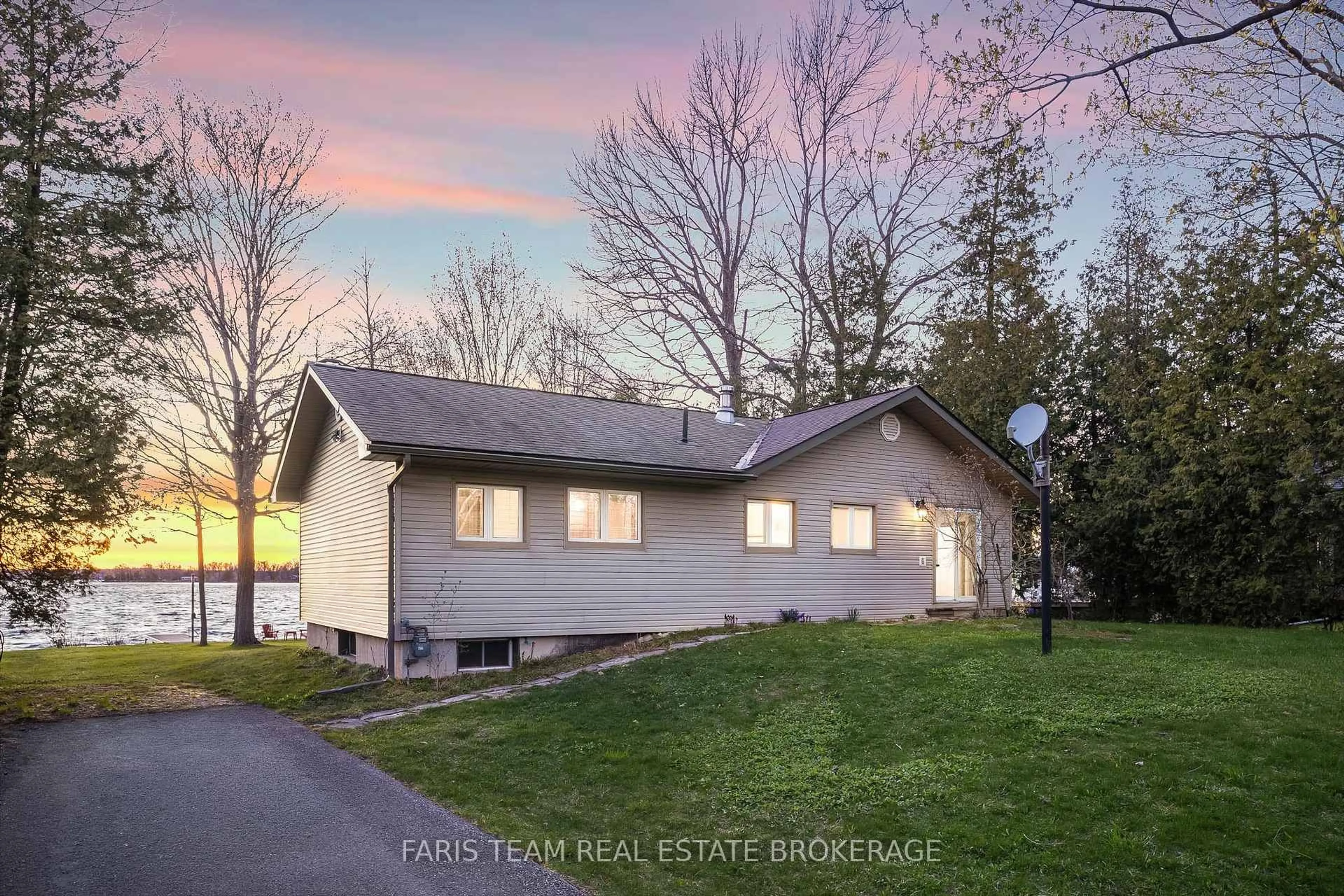 Home with vinyl exterior material, street for 5240 Prospect Ave, Ramara Ontario L3V 0Z1