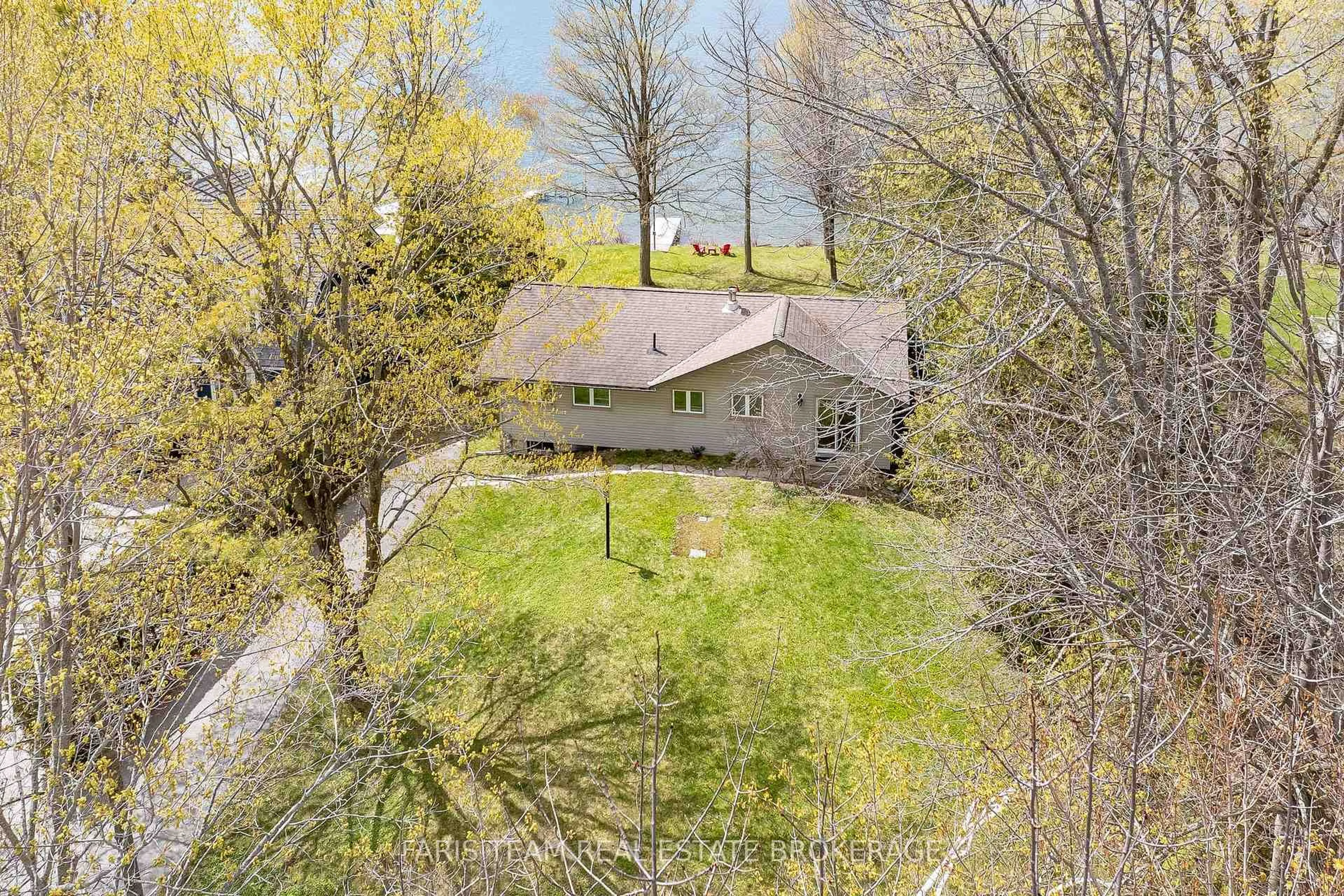 A pic from outside/outdoor area/front of a property/back of a property/a pic from drone, water/lake/river/ocean view for 5240 Prospect Ave, Ramara Ontario L3V 0Z1