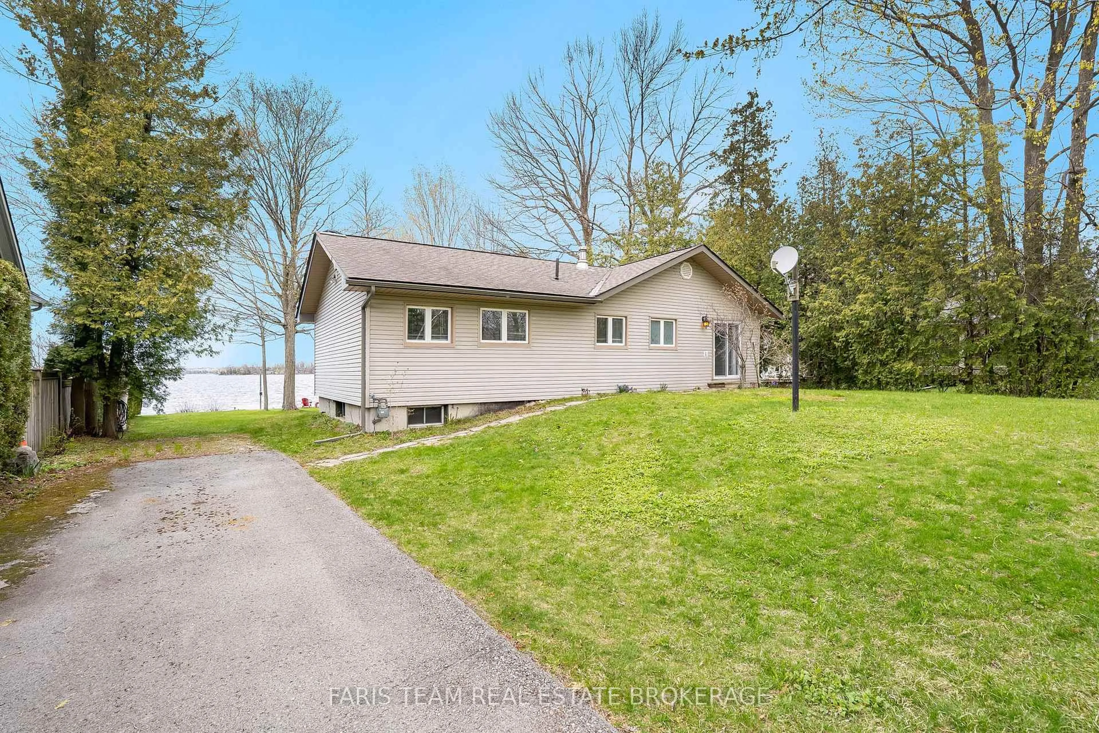 A pic from outside/outdoor area/front of a property/back of a property/a pic from drone, water/lake/river/ocean view for 5240 Prospect Ave, Ramara Ontario L3V 0Z1