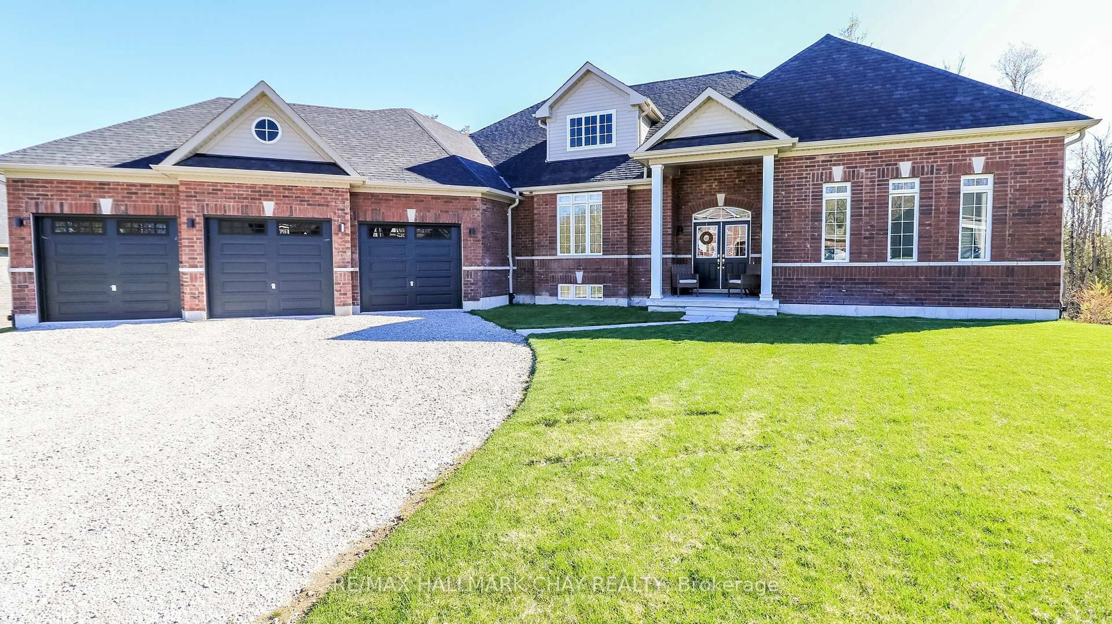 Home with brick exterior material, street for 95 Ruby Ridge Rd, Oro-Medonte Ontario L0L 2E0