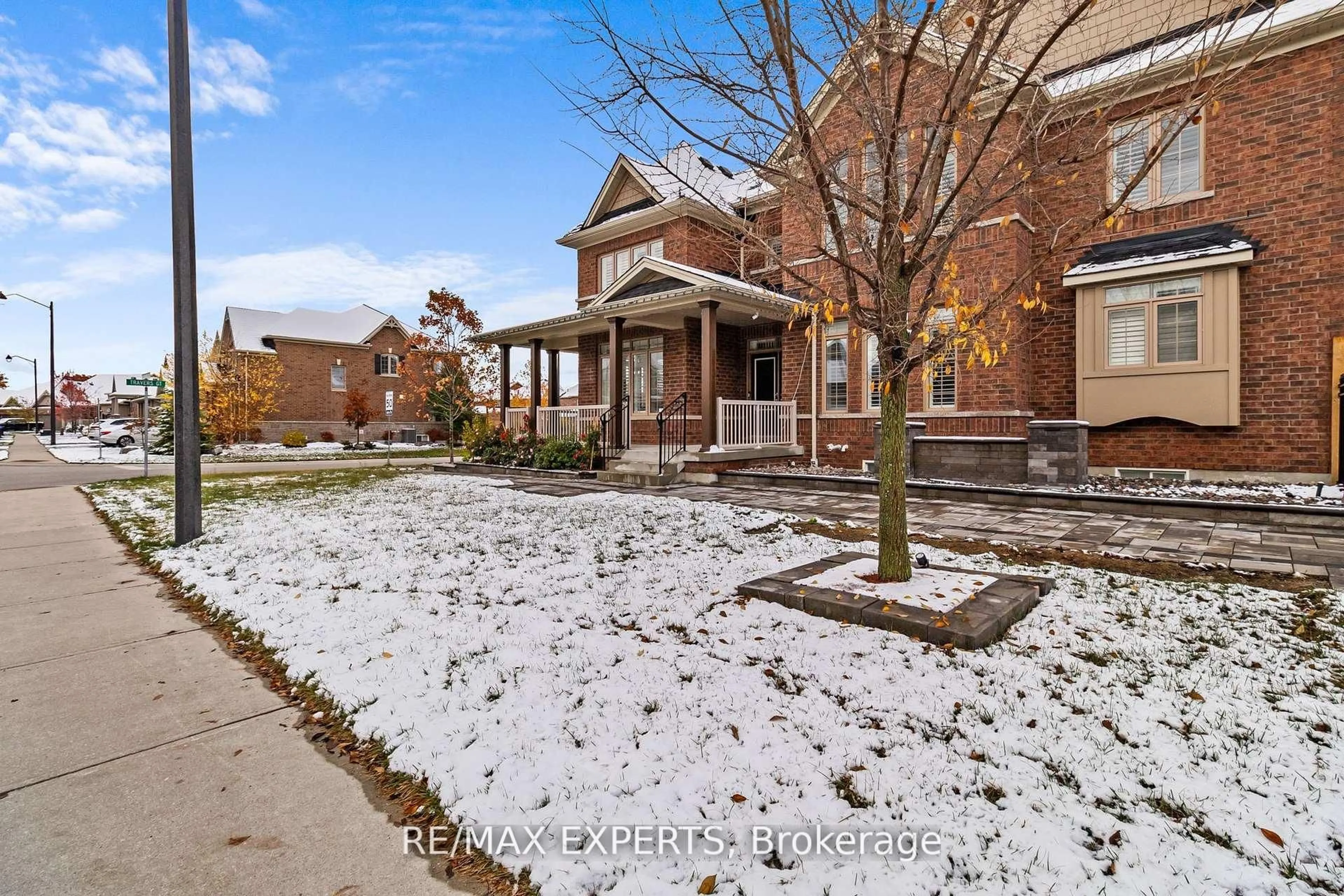 Home with brick exterior material, street for 22 Travers Gate, Springwater Ontario L9X 0S8