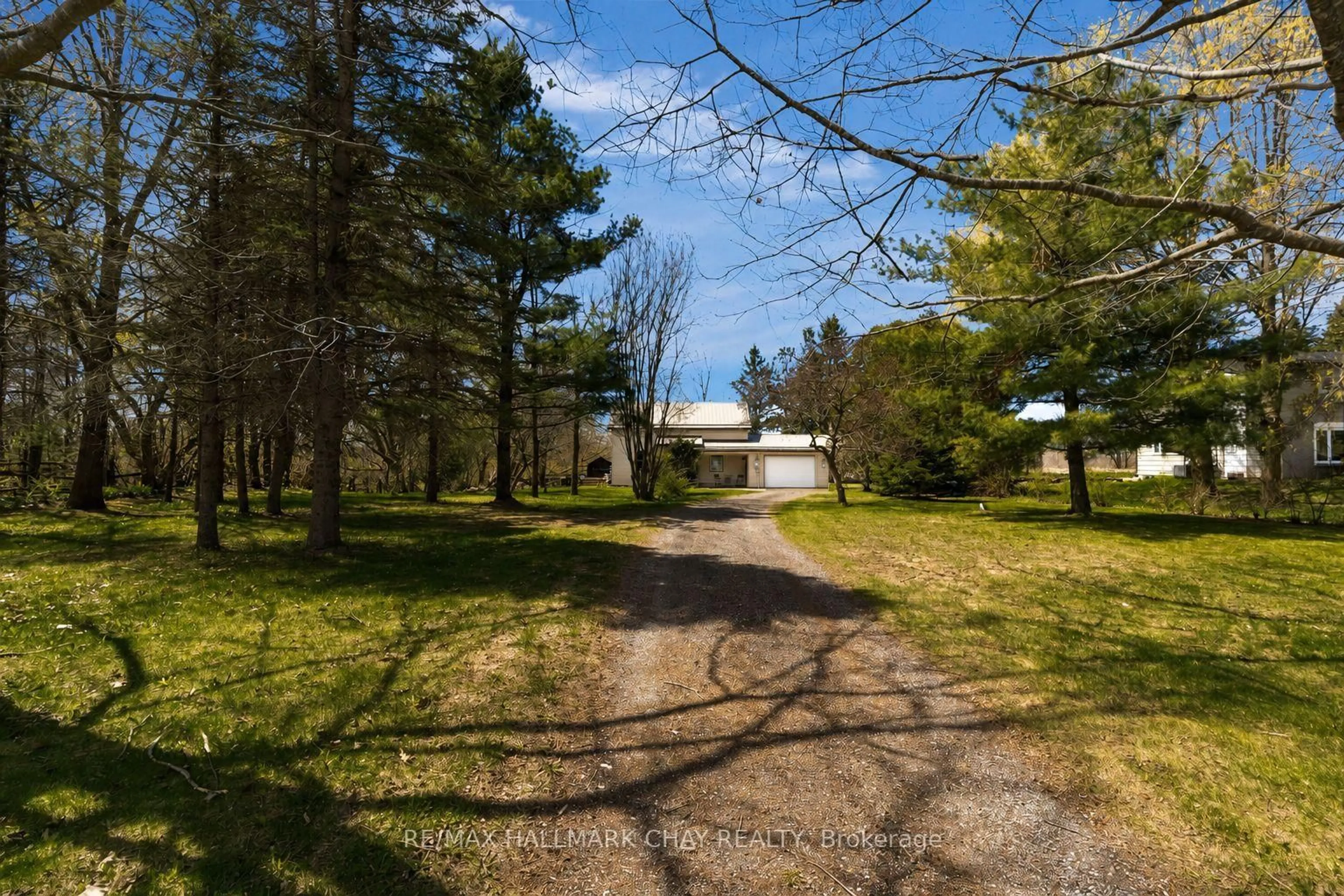A pic from outside/outdoor area/front of a property/back of a property/a pic from drone, forest/trees view for 3324 Penetanguishene Rd, Oro-Medonte Ontario L4M 4Y8
