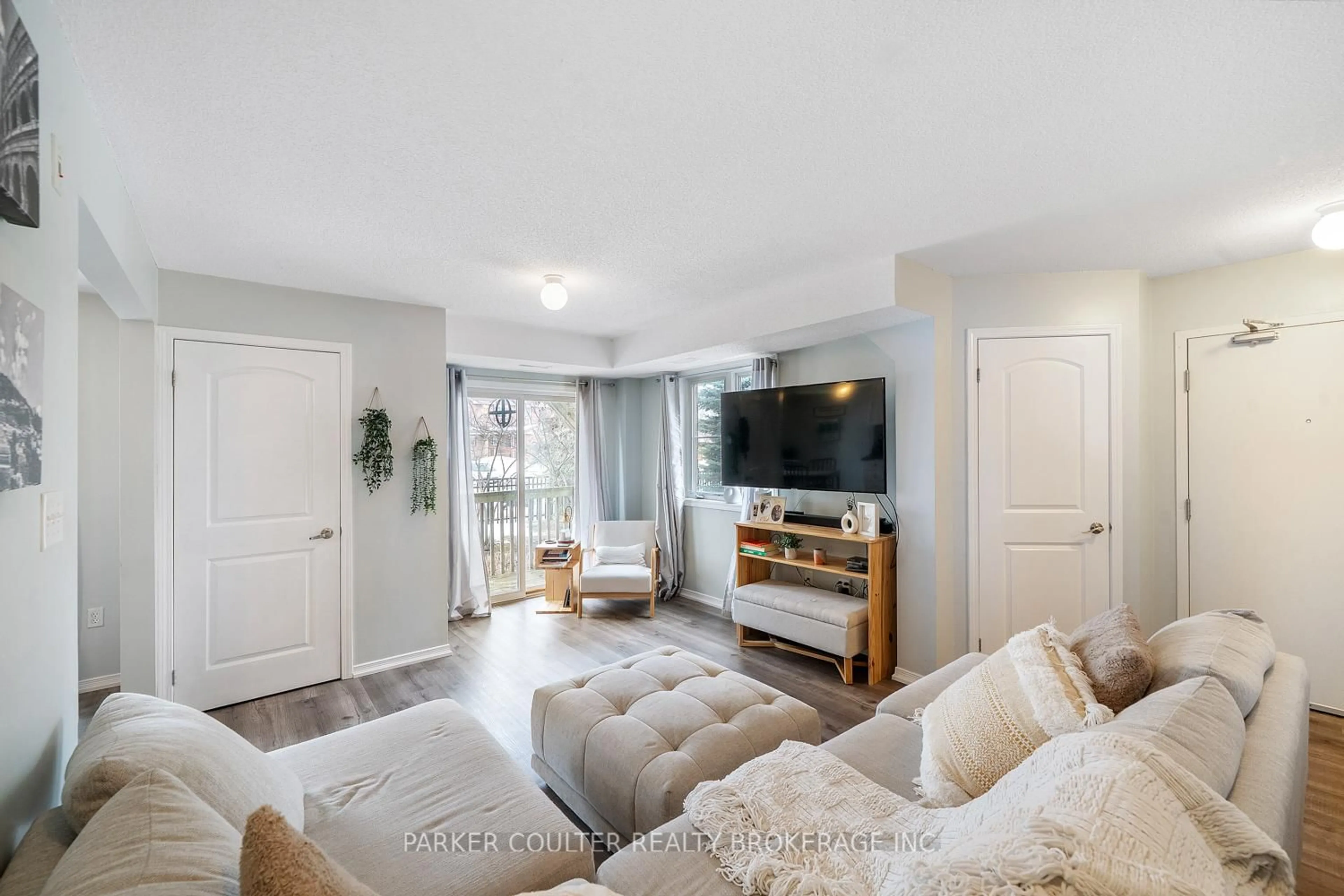 Living room with furniture, unknown for 17 Cheltenham Rd #4, Barrie Ontario L4M 0E7